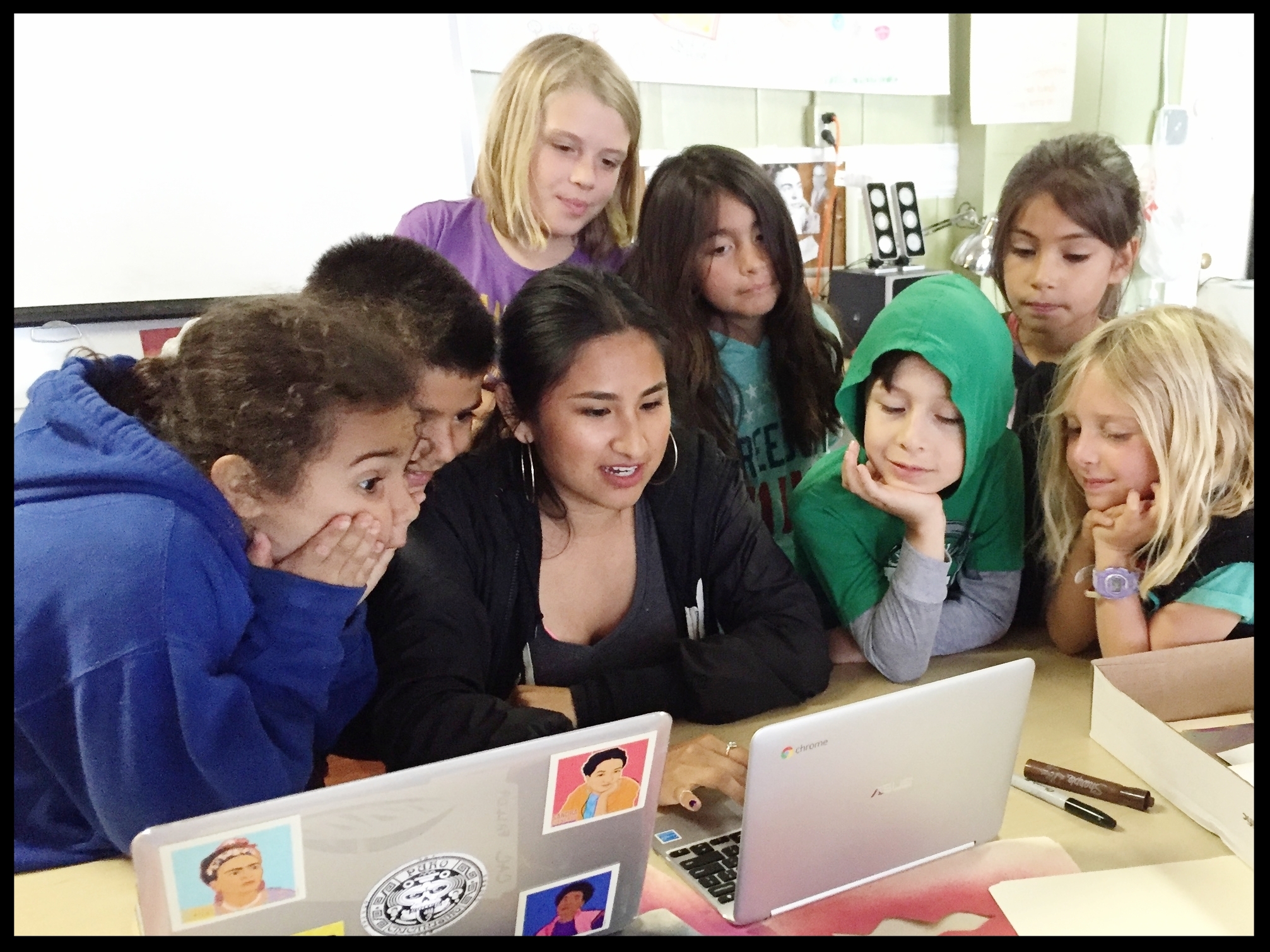 Helen DIaz Calvo shares tech skills with community youth at our 2nd annual Art & Design Summer camp.