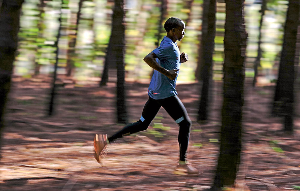 Kipchoge, The Olympic champion with a PR of 2:03:05.