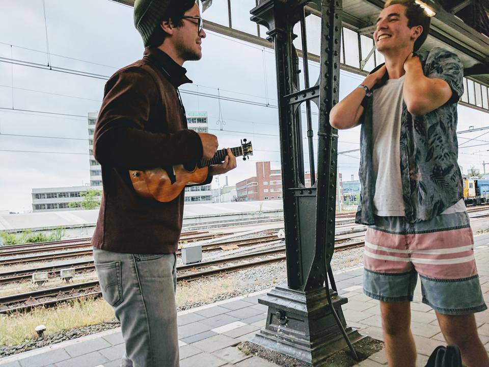 Freestyle rapping to pass time as we wait for our train to take us back home. Little did we know there was a tree in the middle of the railroad, we arrived back home at 3 am. 