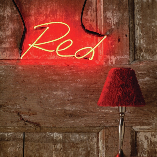 Red neon sign from The Letter Room. 