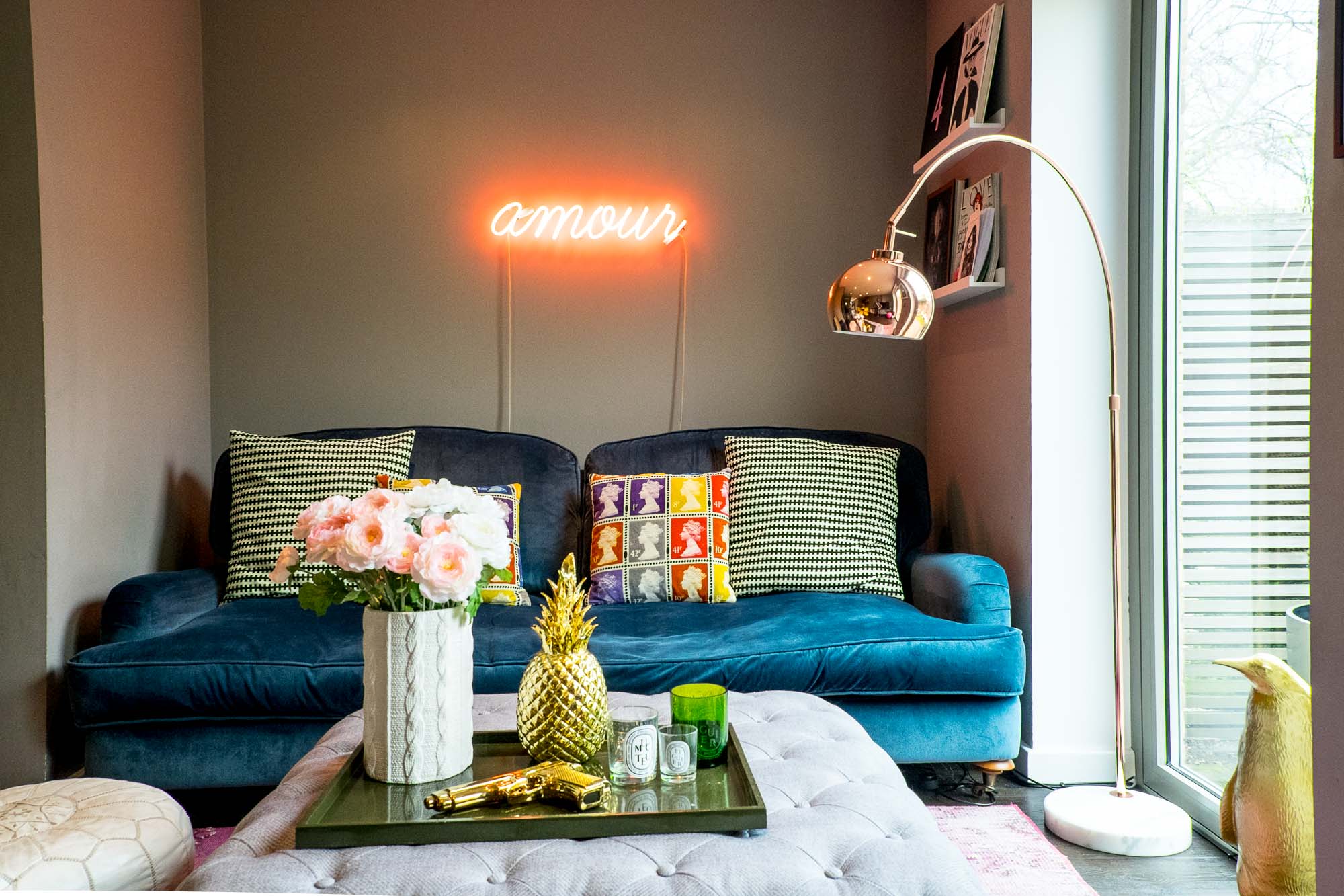 Stella + the Stars' own living room embraces the copper trend with a floor lamp from M&S home