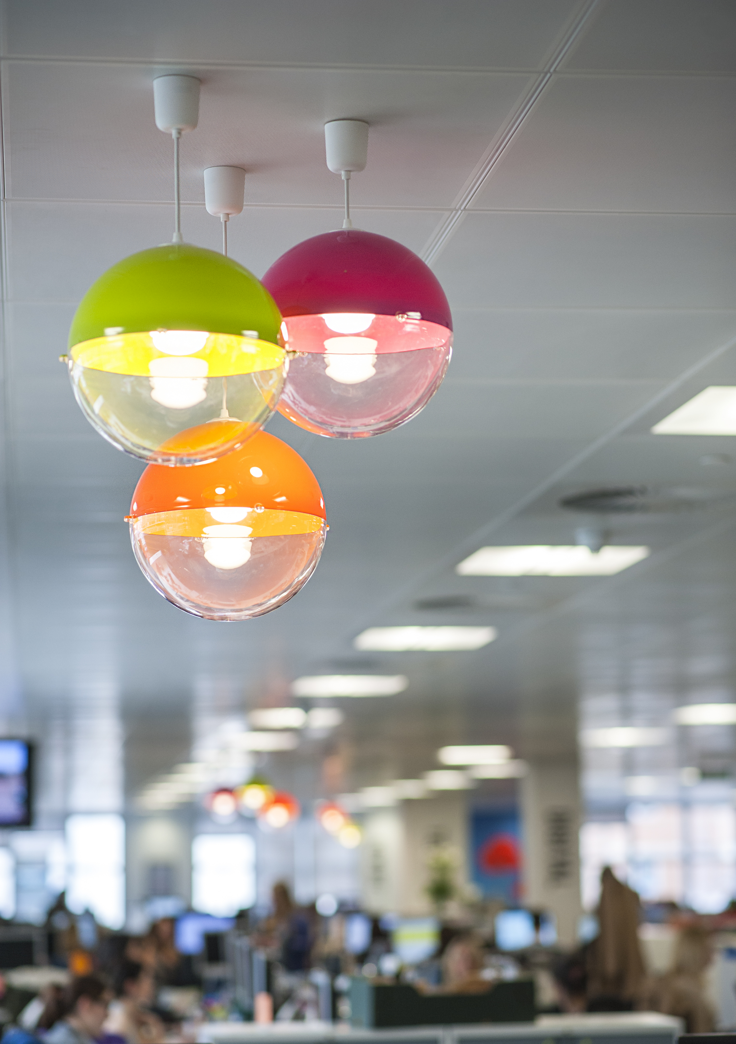 clusters of colourful lampshades dotted around the office added colour and quirk (PHOTO CREDIT: ELIZABETH ARGYLL )