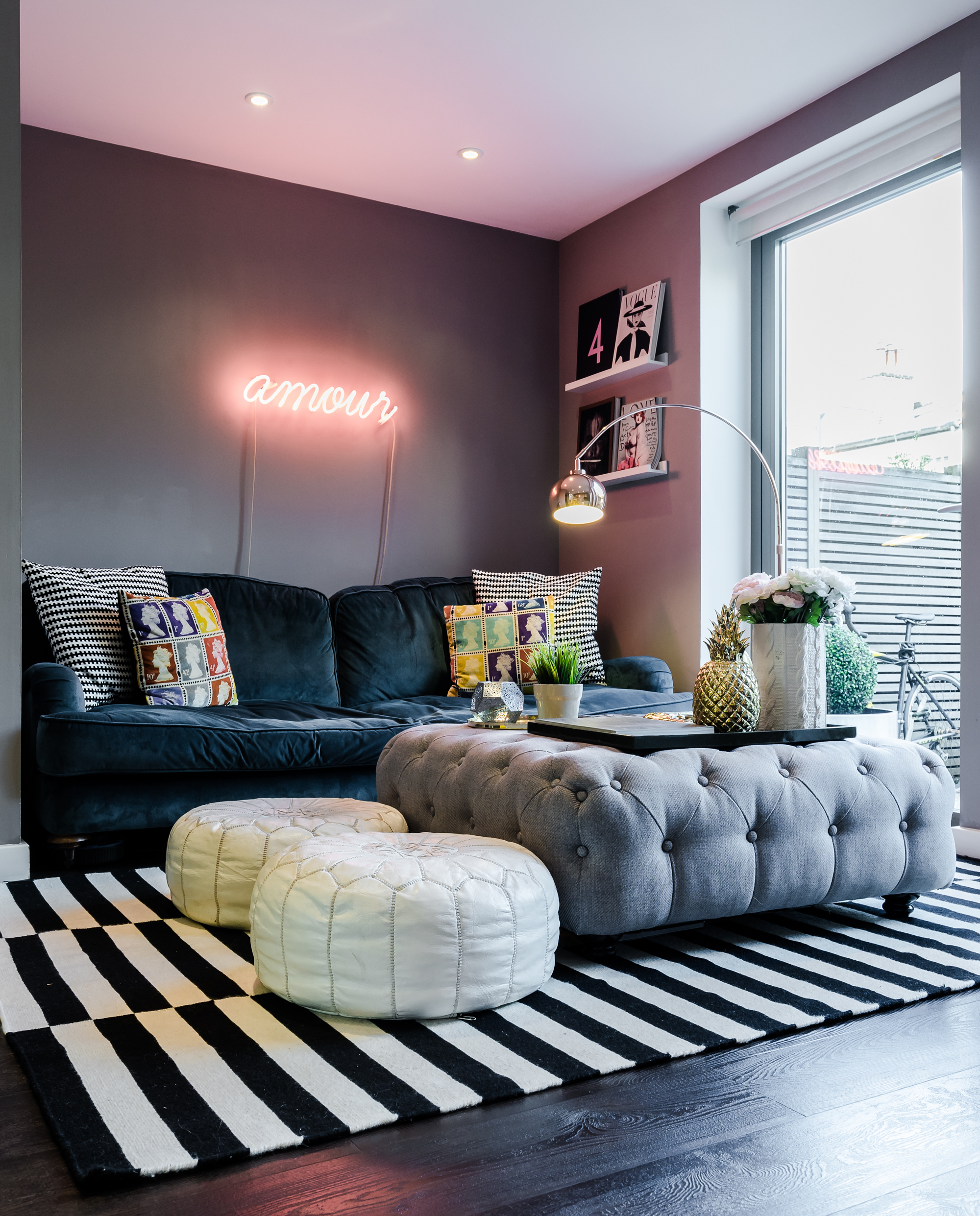 My pad in London, full of bright colours, dark walls, with its velvety sofa, golden pineapple and all. 