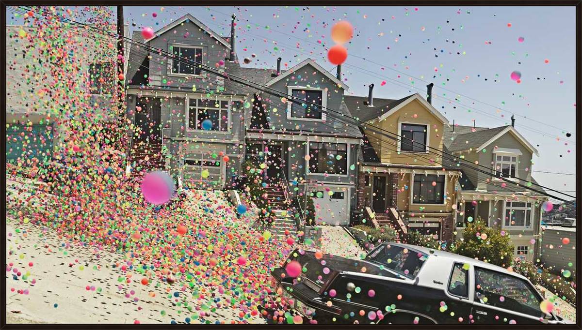 I feel head over heels with Danish photographer Peter Funch's shots taken during the Sony TV advert where 250,000 multicoloured balls were let loose in the streets of San Francisco. 