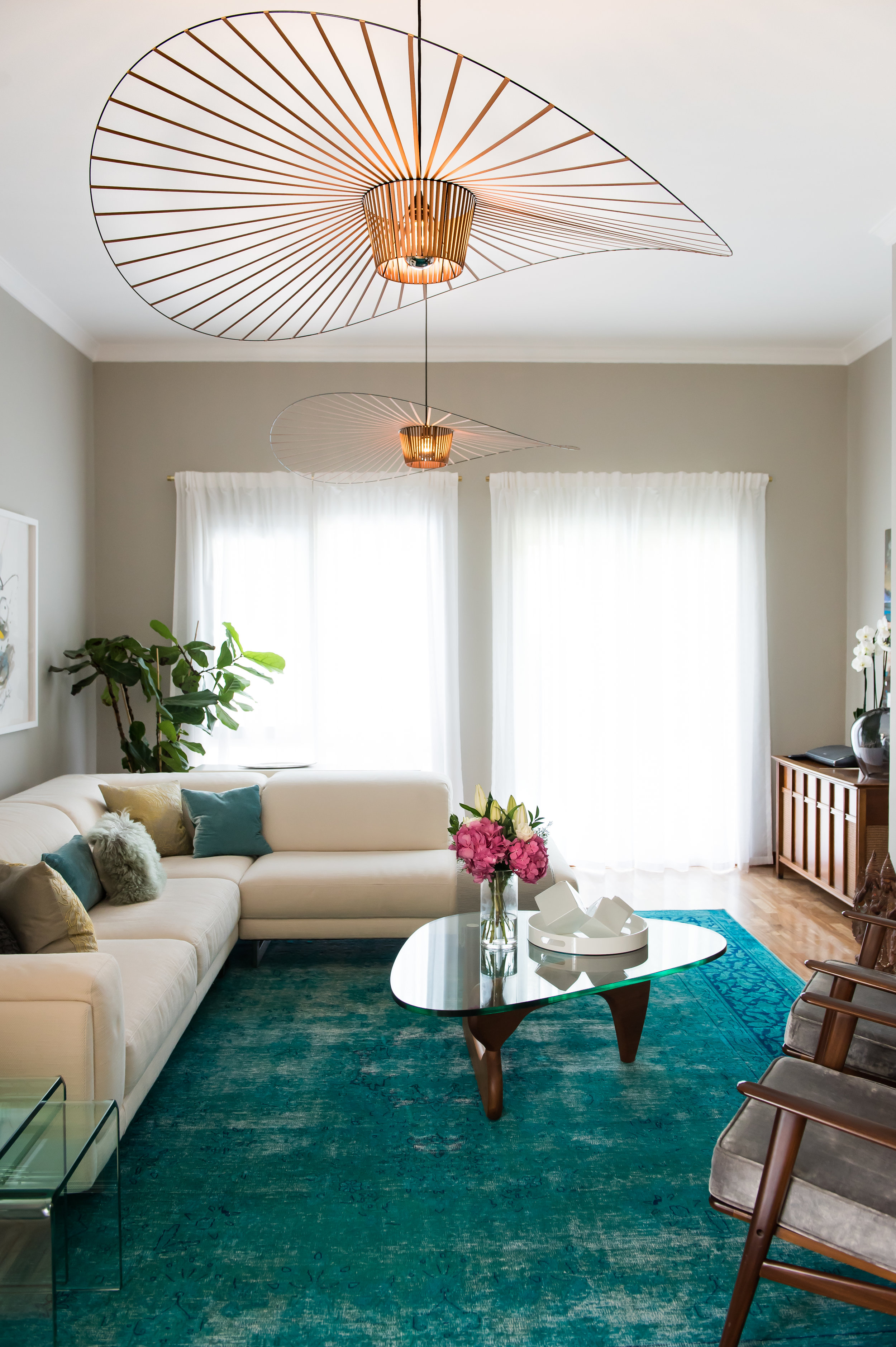 The after shot with statement lighting and heavenly rug... 