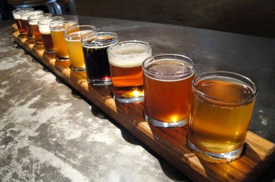 Flight sampler of craft beer, image from Temple U .