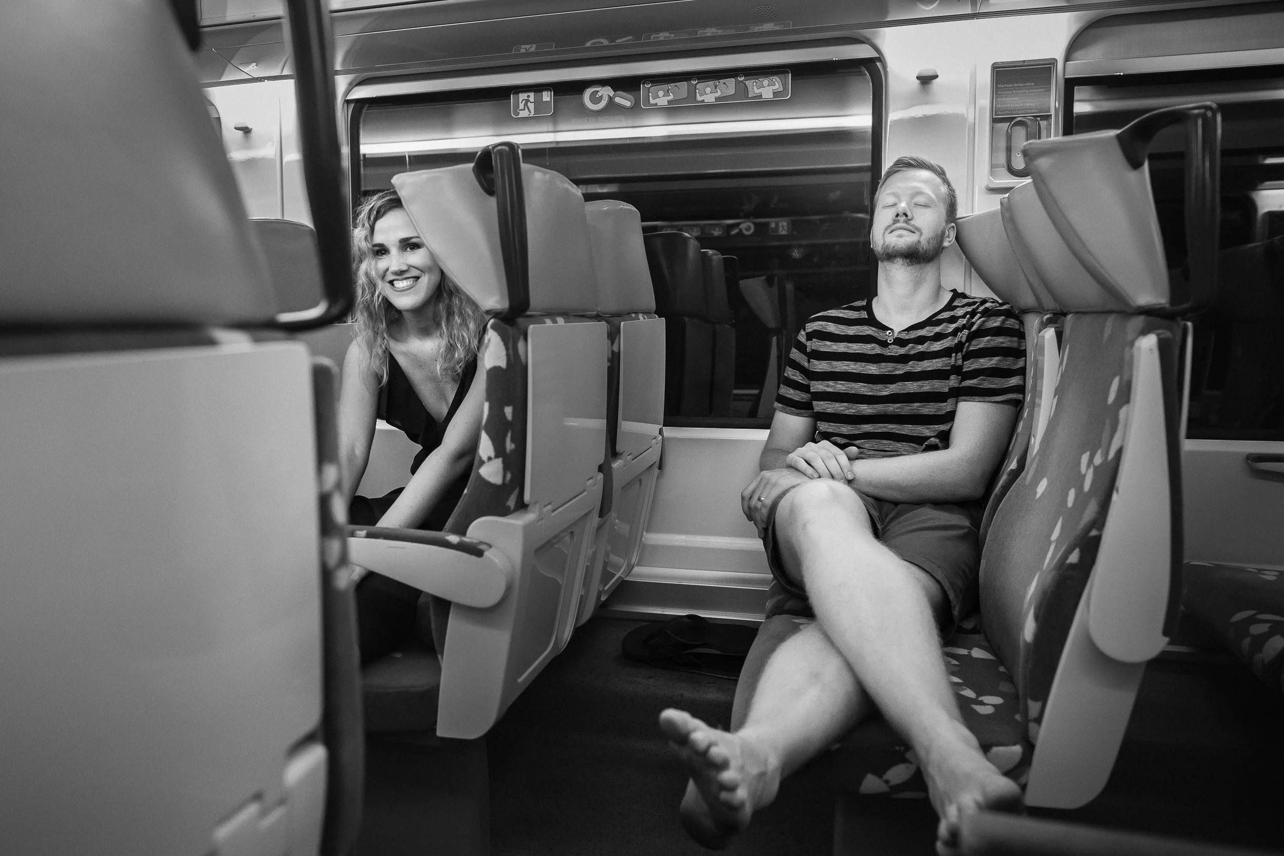 Emily and Mike rest after sprinting for the train.