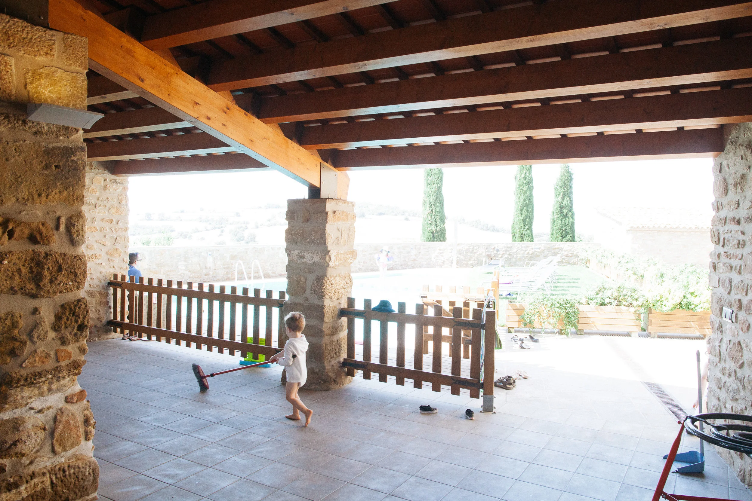 Emmett sweeps the veranda in prep for the wedding.