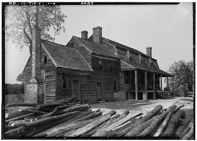 Wyoming circa 1930 courtesy of Historic American Building Survey. The logging shown in this photo is evidence of the historic need for diversification on farms. 