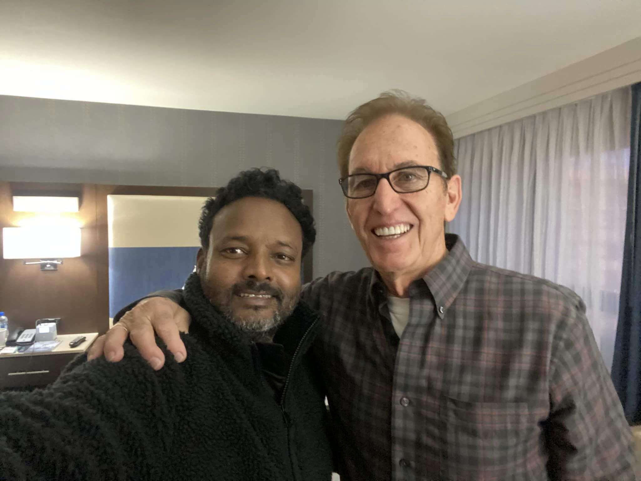 Prasad and John Pfeifer - room share.jpg