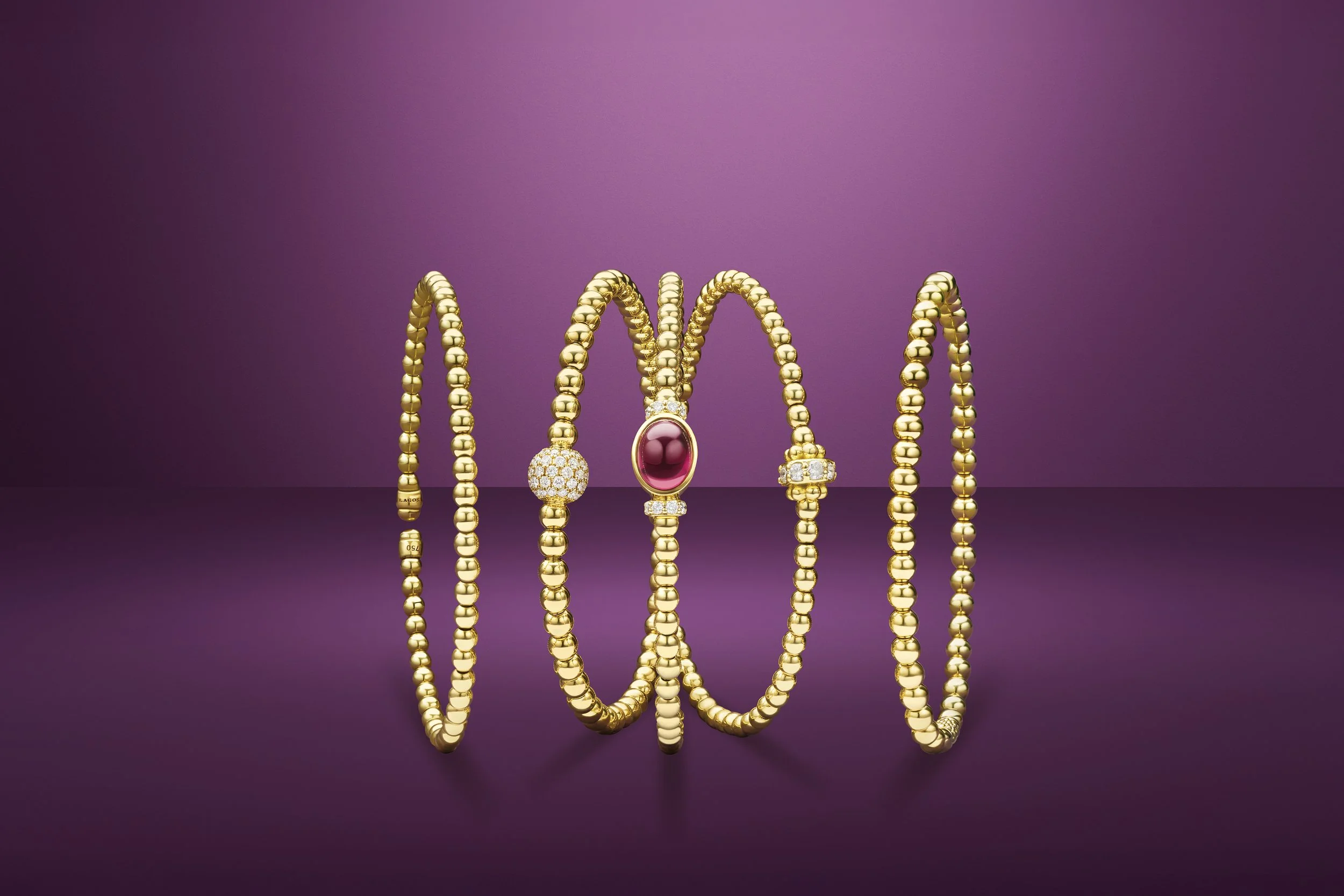Fall25_Gold_Diamond_Garnet_Bracelet_Stack.jpg