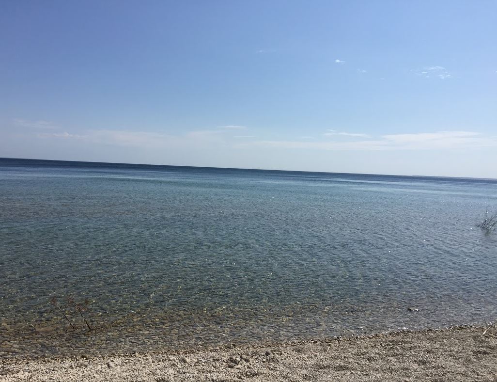 This is a real lake people. Fresh water can be clear too.