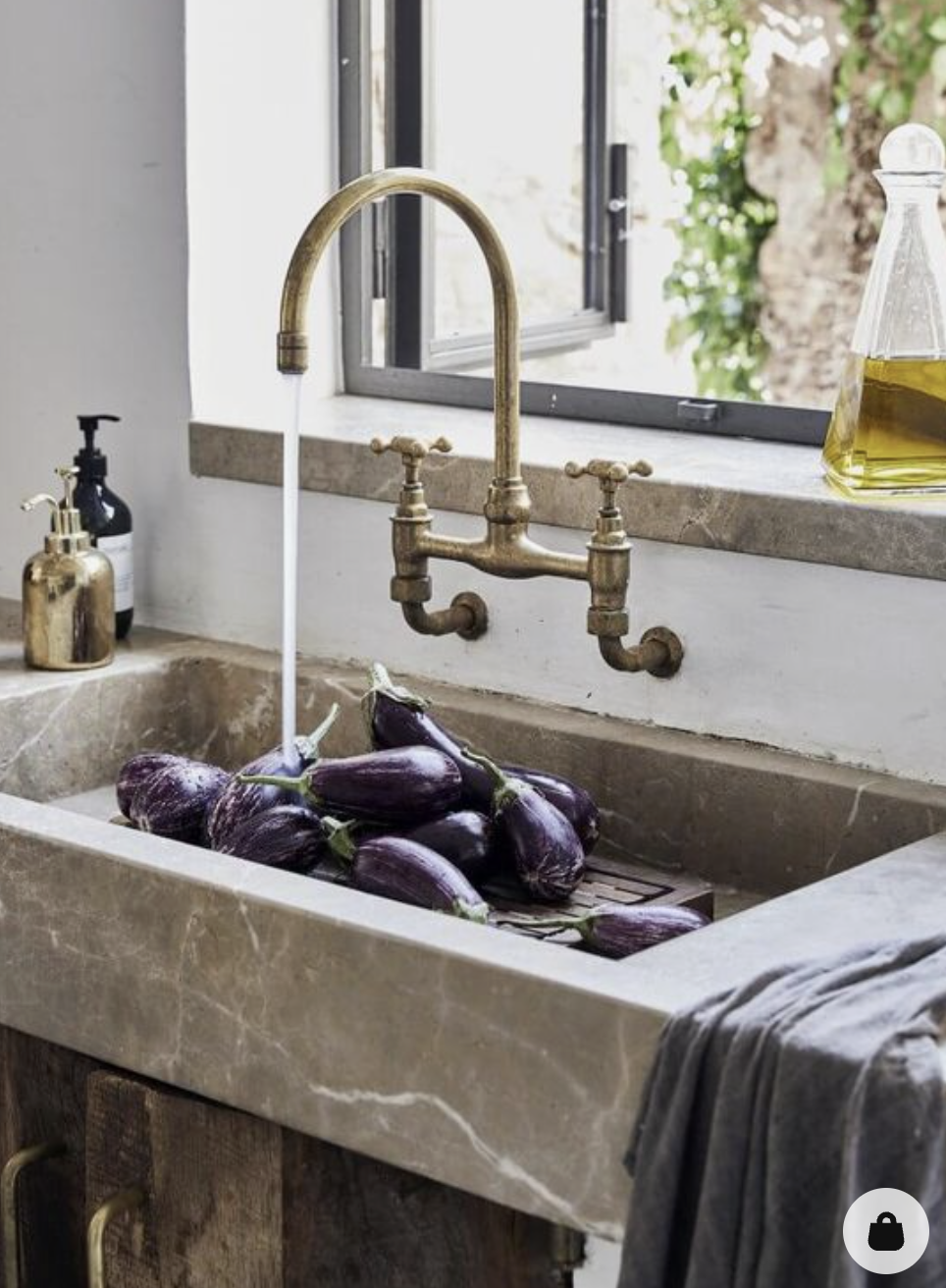  Sink in stone not deep in a rustic kitchen 