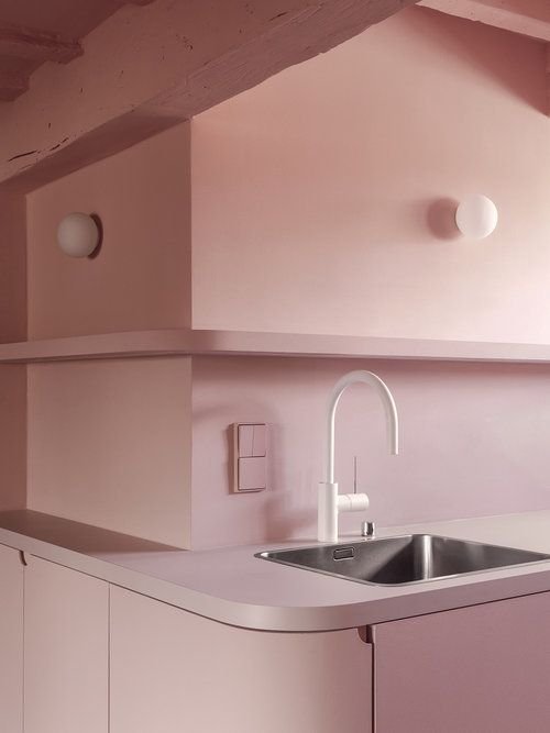  Soft pink kitchen cabinet monochromatic look with a white faucet 