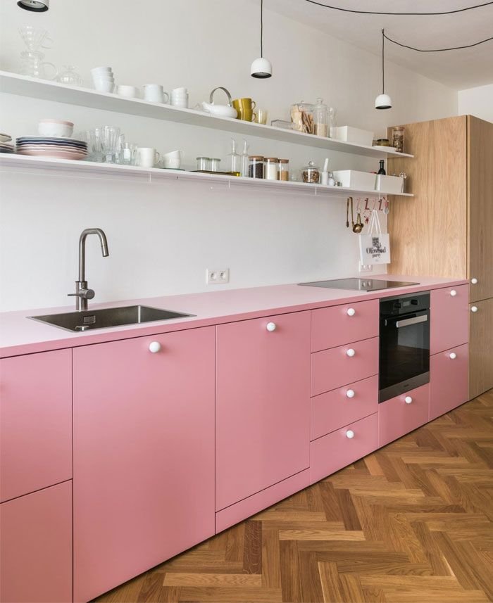  Pink kitchen with a modern vibe, wood floors 