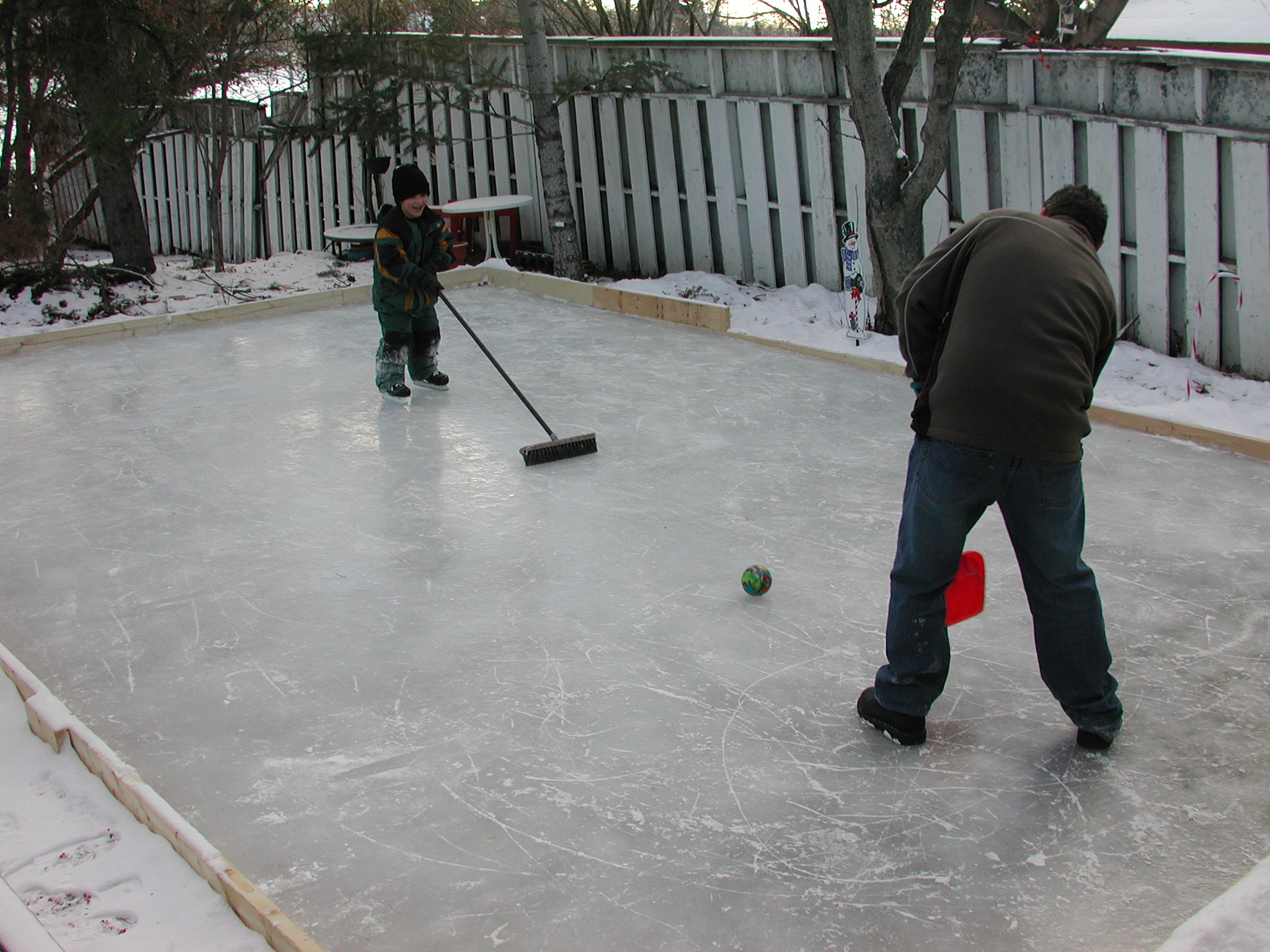 Aaron had just learned to skate on his own, playing a form of Broomball with his Uncle Kevin. 