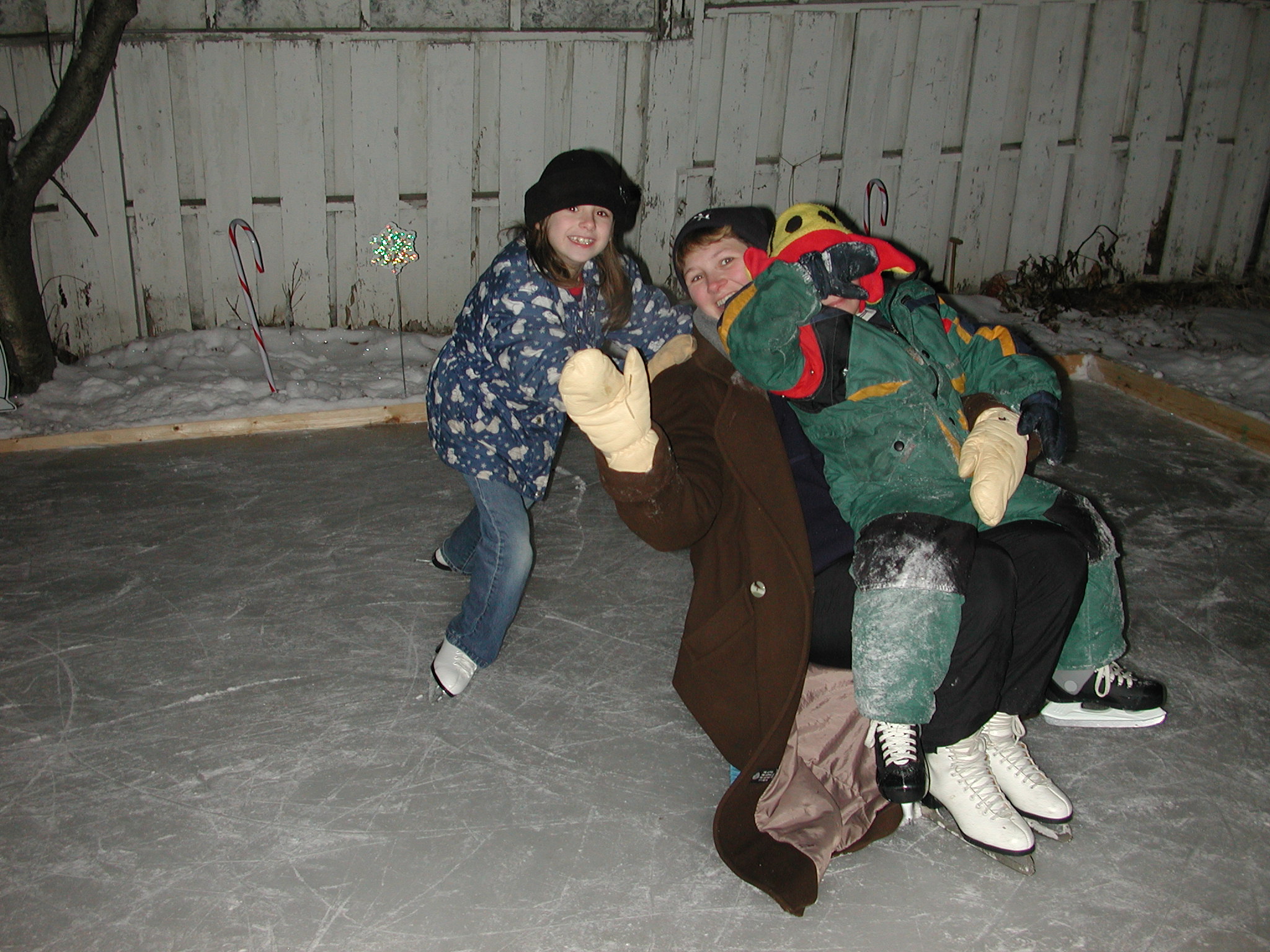  Alora pushing me around on milk crate, while Aaron catches a ride. (a little camera shy)