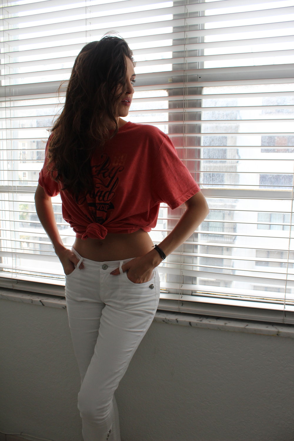 Red T-shirt white trousers fashion photography