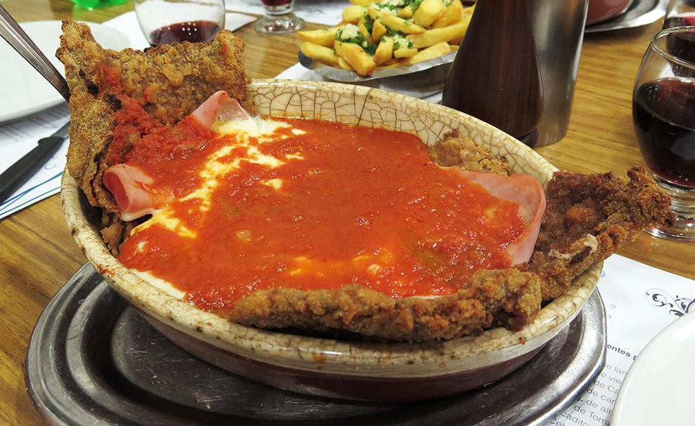 It is so large it hangs out of the plate!