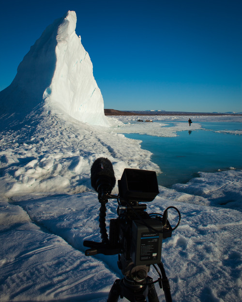 Filming an Ice Berg where the locals gather ice for fresh water.