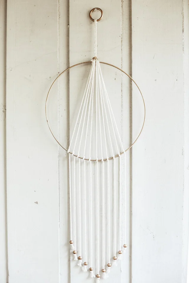 Modern brass wall hanging