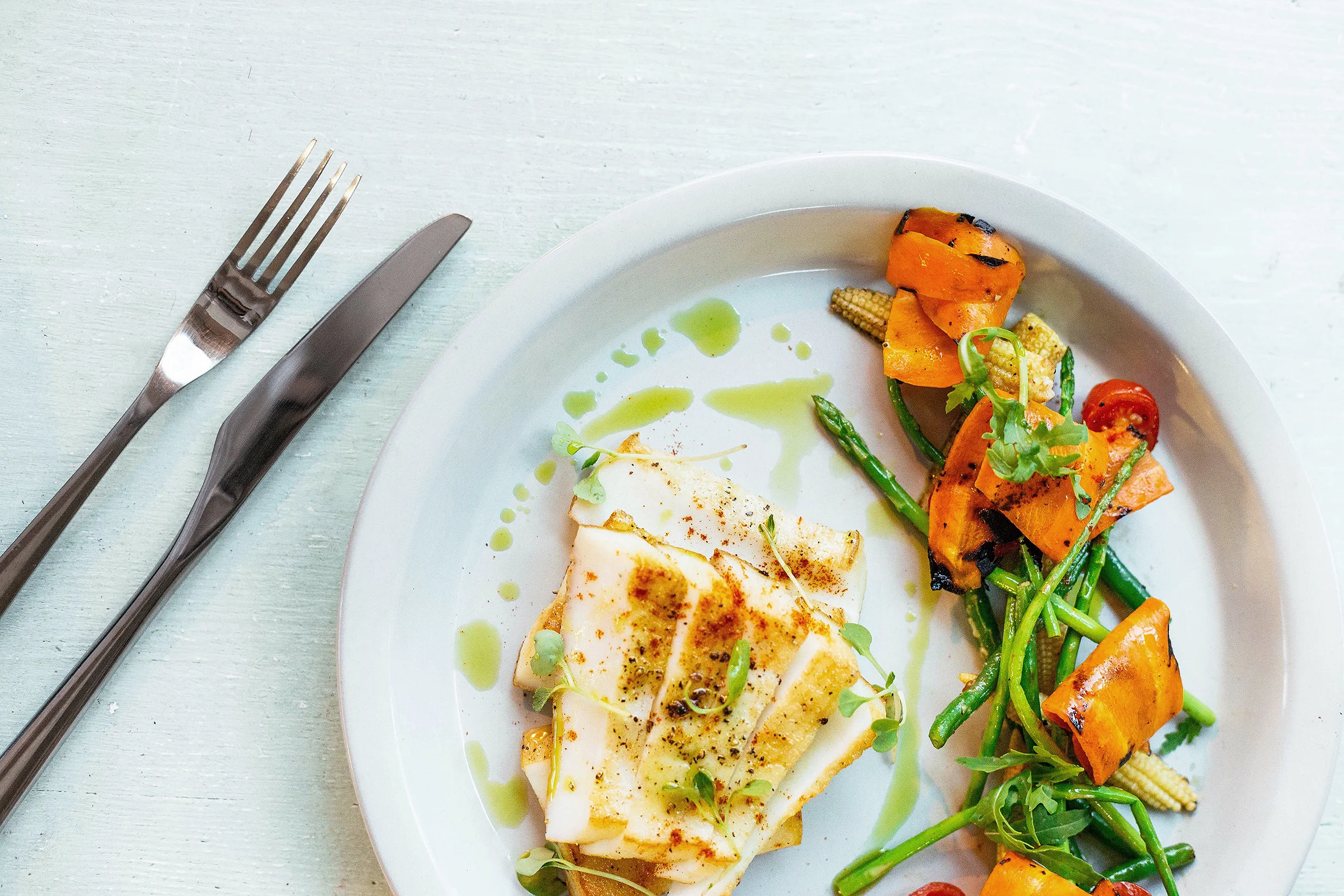 Grilled Giant Humbolt Squid Steak w/ baby vegetables & herb oil