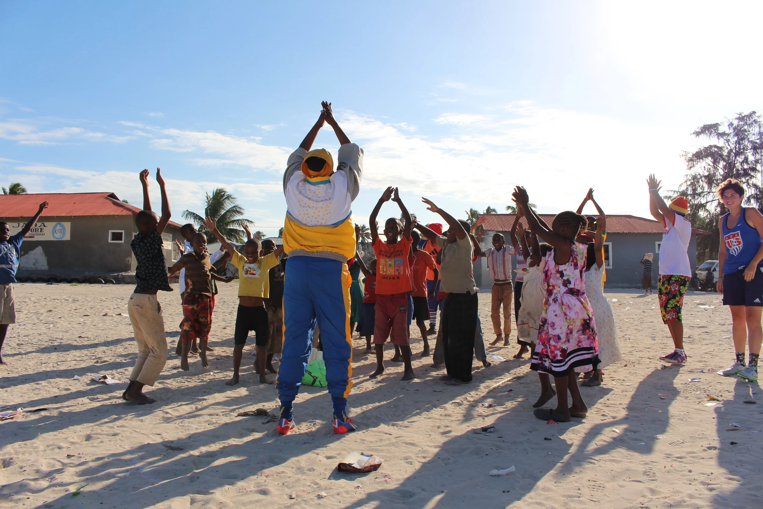 Bettina leading the soccer warm-up in Paje