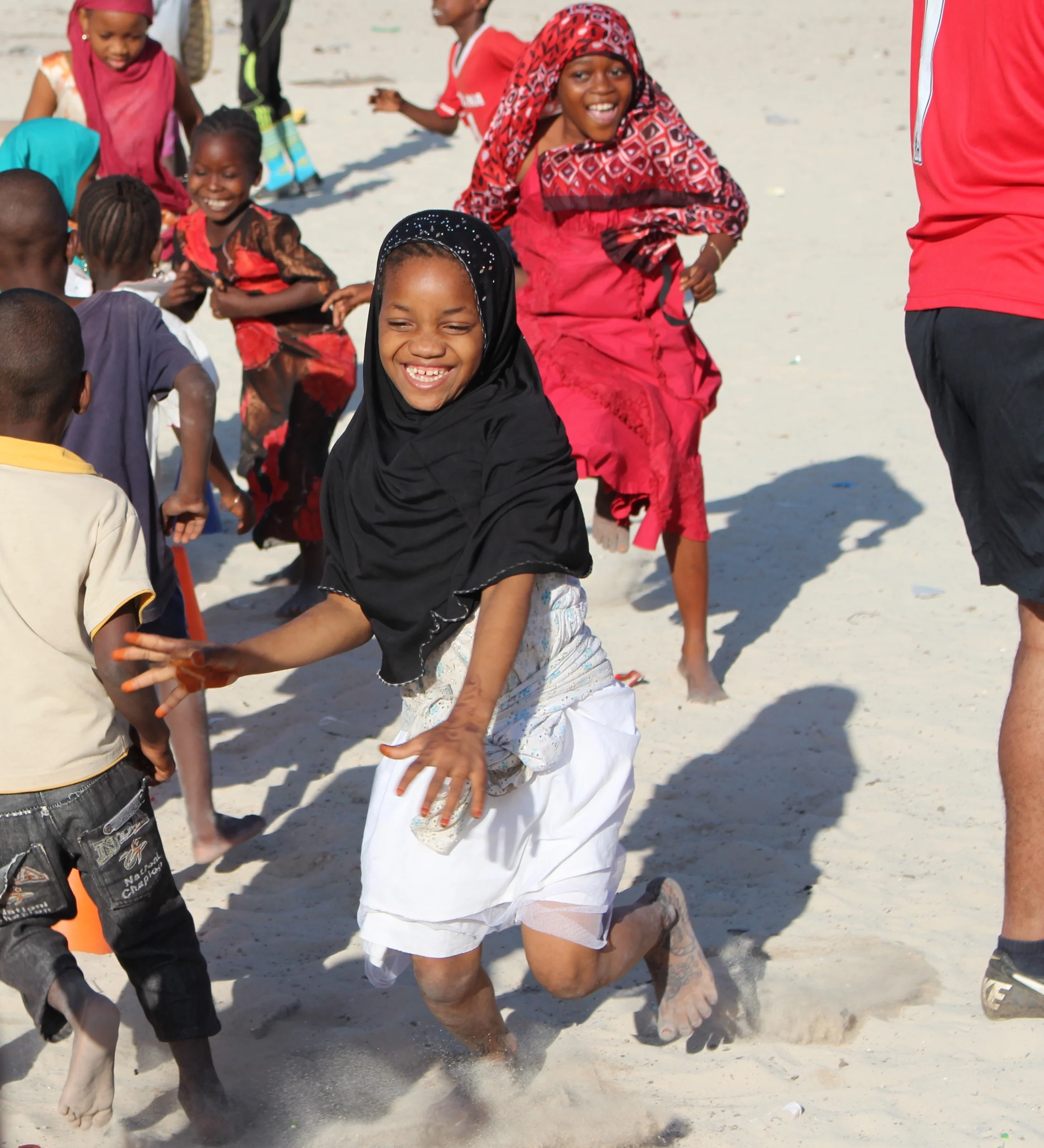 Girls participate in Paje soccer clinic, July 2015