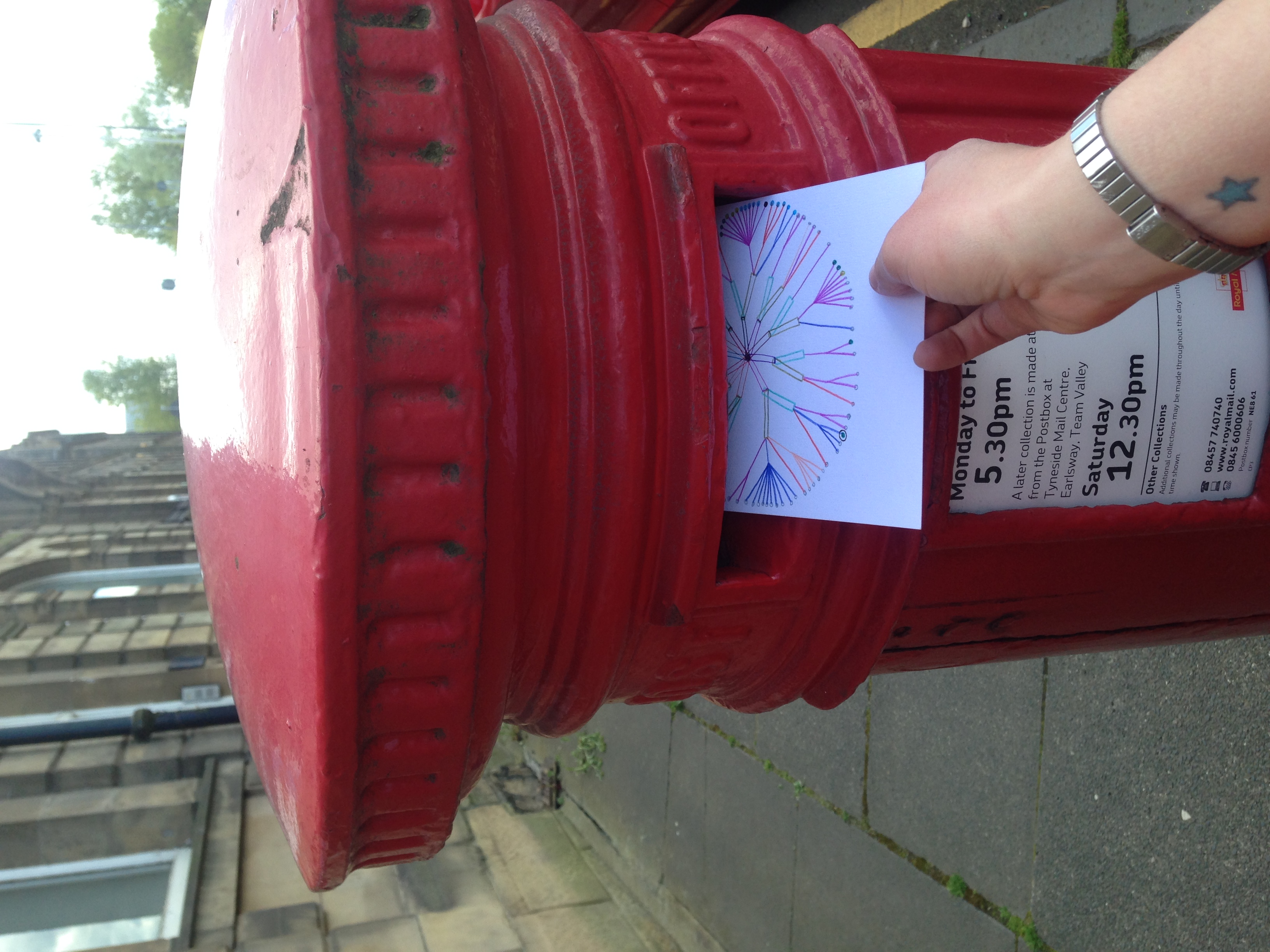 Posting the second card while on a trip to Newcastle