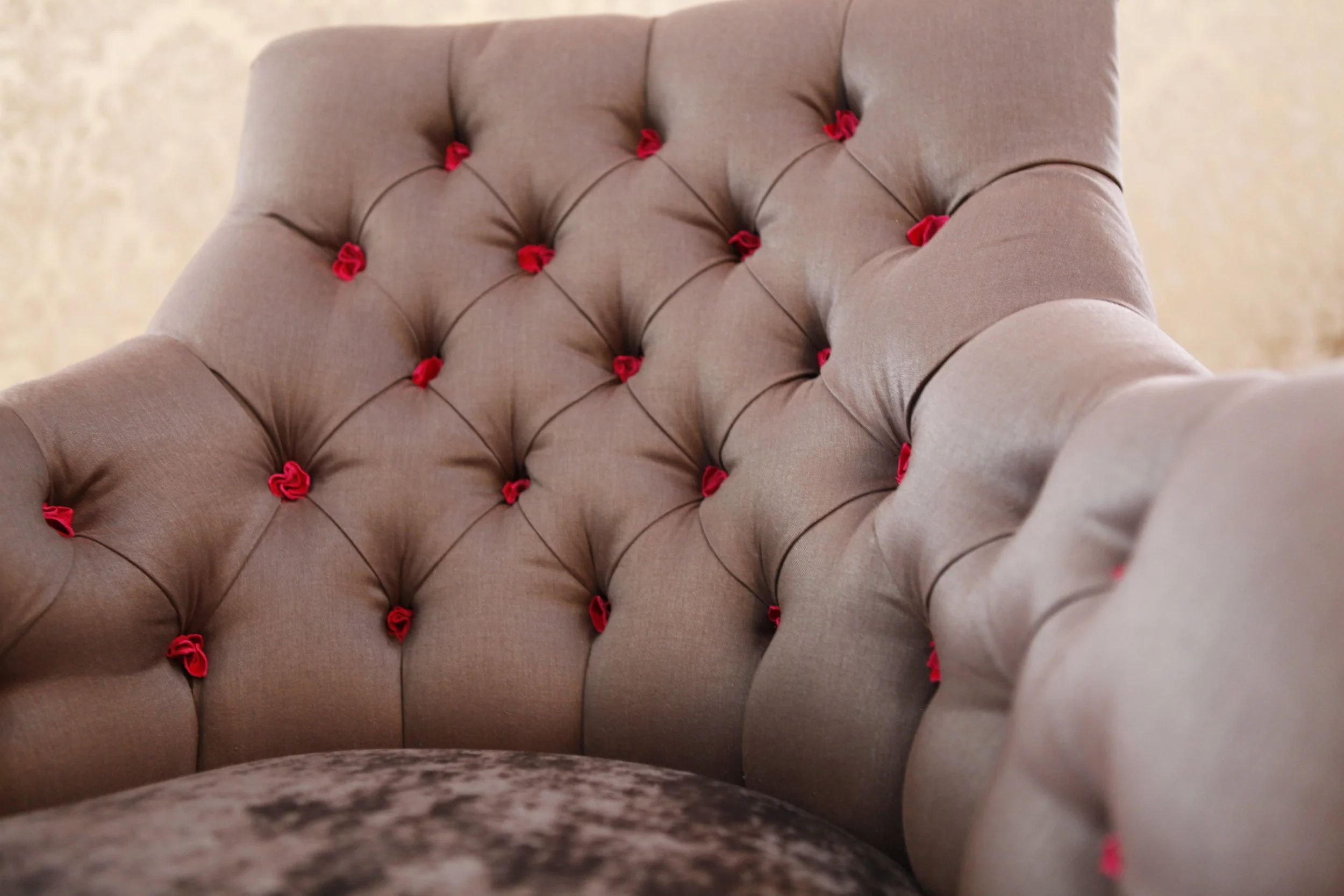 Choice of buttons or leather tufts. You could have contrast fabrics in the seat and back to add that personal touch.