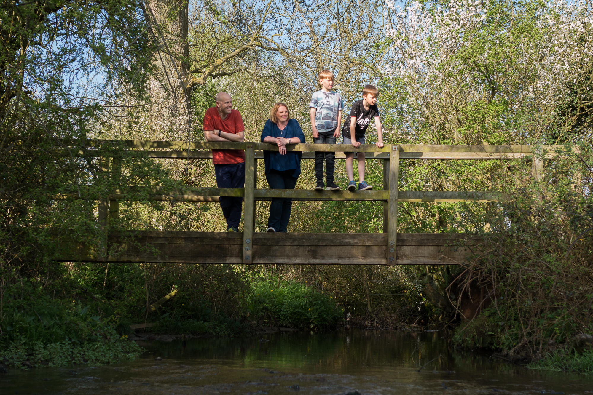 family on bridge