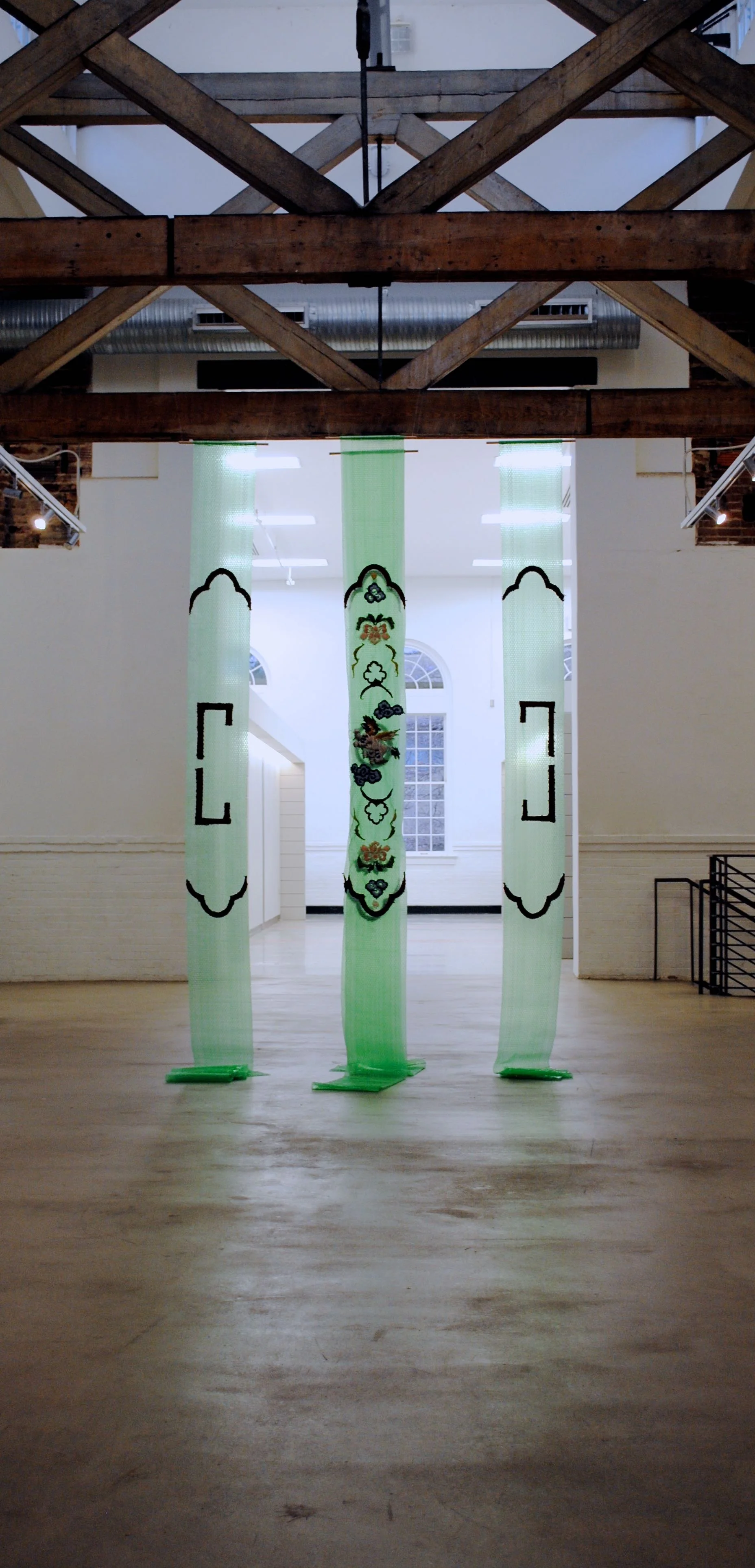  I was happy that from a distance the bubble wrap could have been mistaken for a gauzy fabric.  In the future I plan to add another 20' of bubble wrap to the bottom of each panel so that they heap onto the floor. 