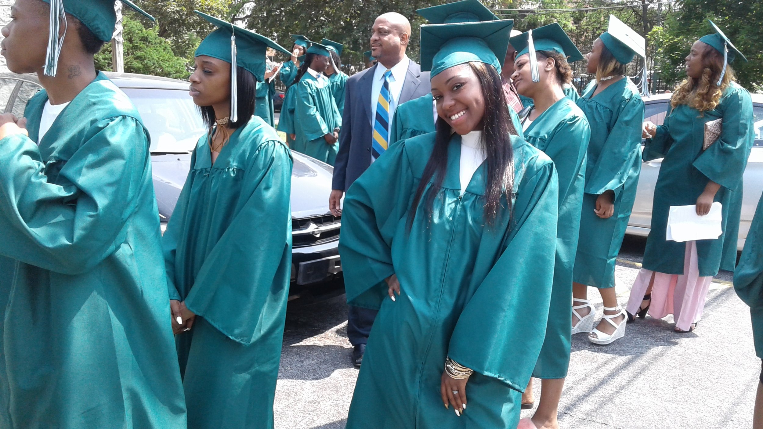  Community Youth Development Institute Student Graduate Smiling