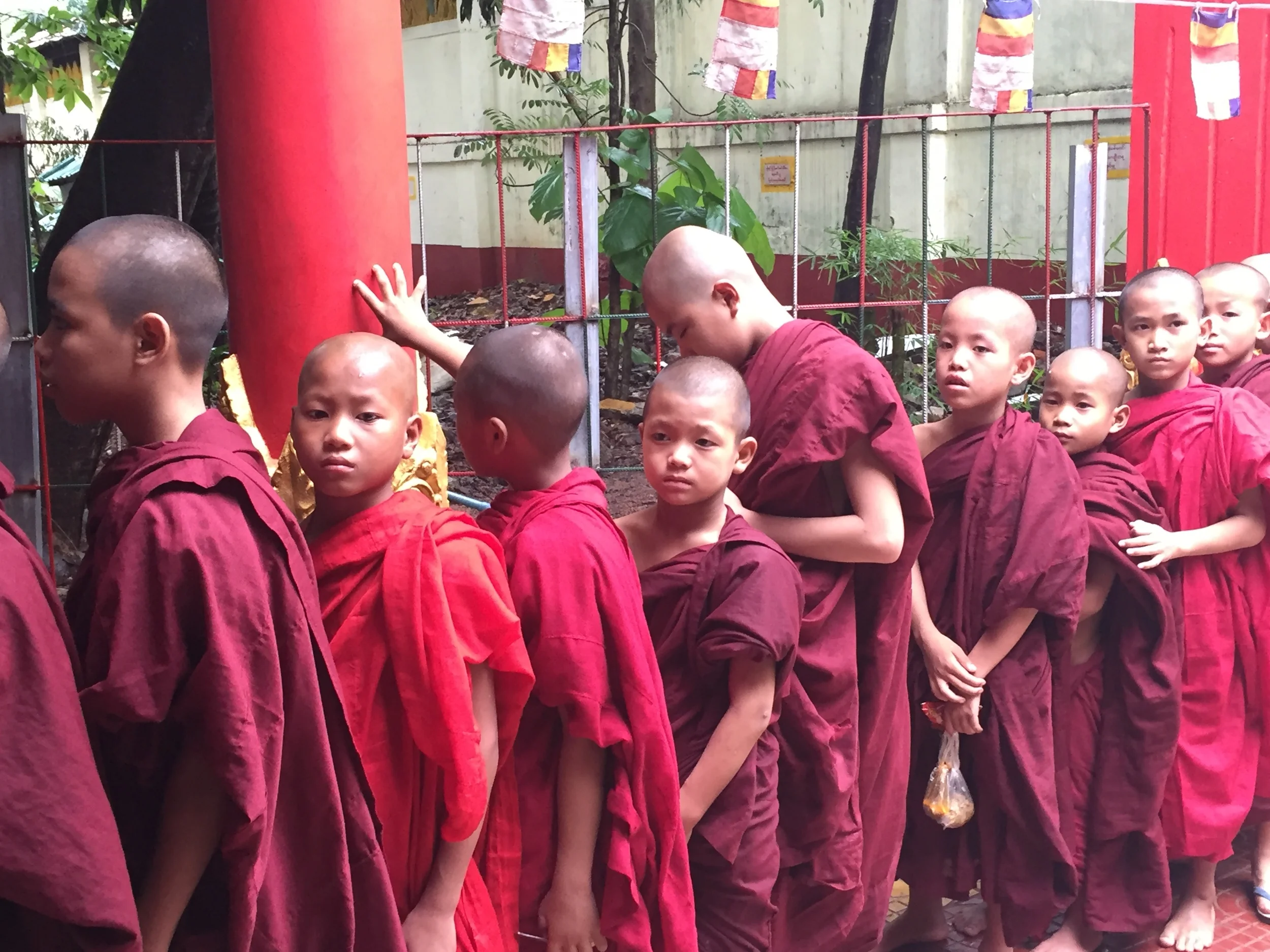  Buddhist Monks lining up for lunch