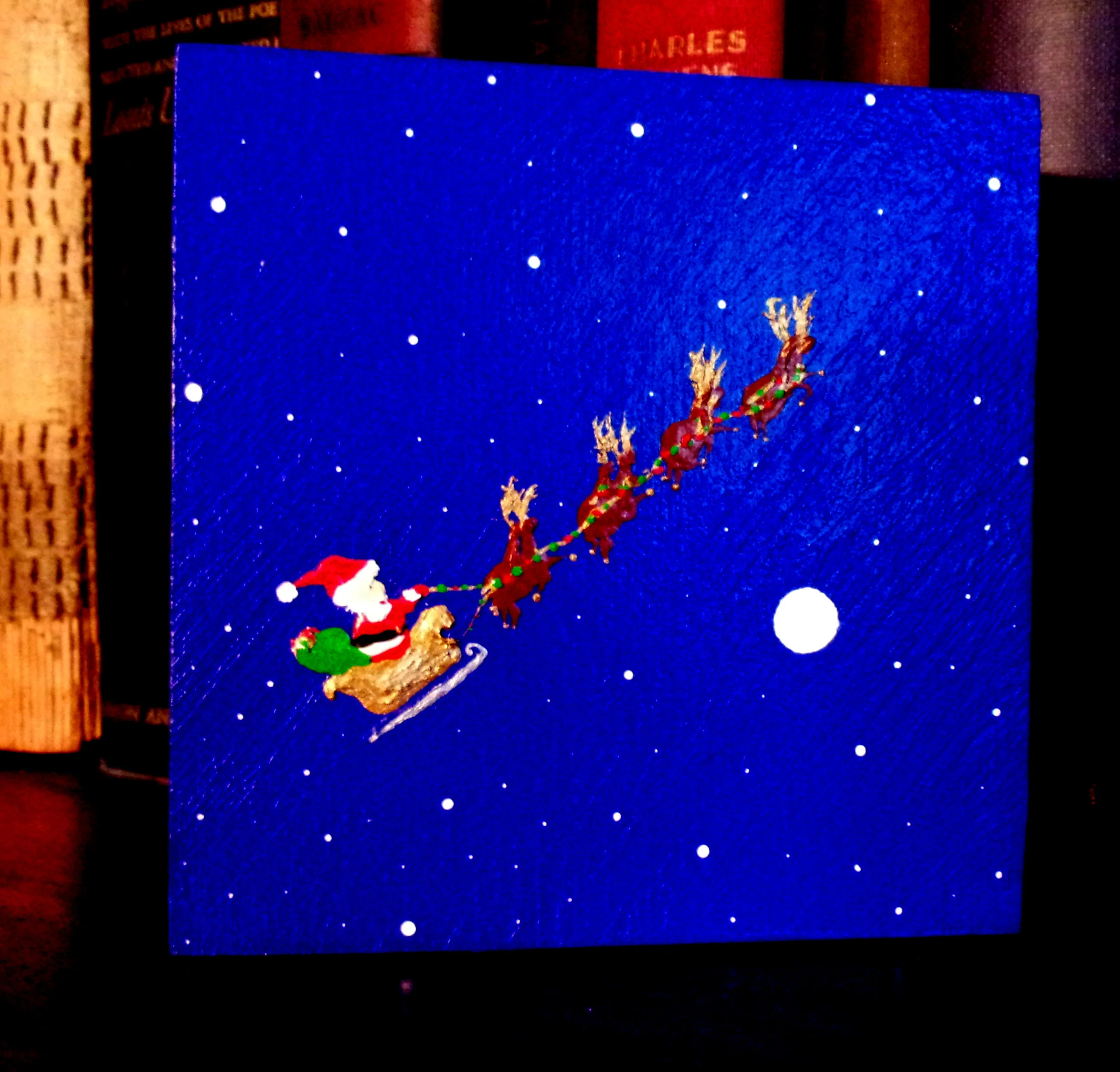 "Santa, Sled, and R eindeer (Scenes Of The Seasons)" by Kevin Oechsli, Mini Painting, Acrylic on Wood (2016), $30 | BUY NOW