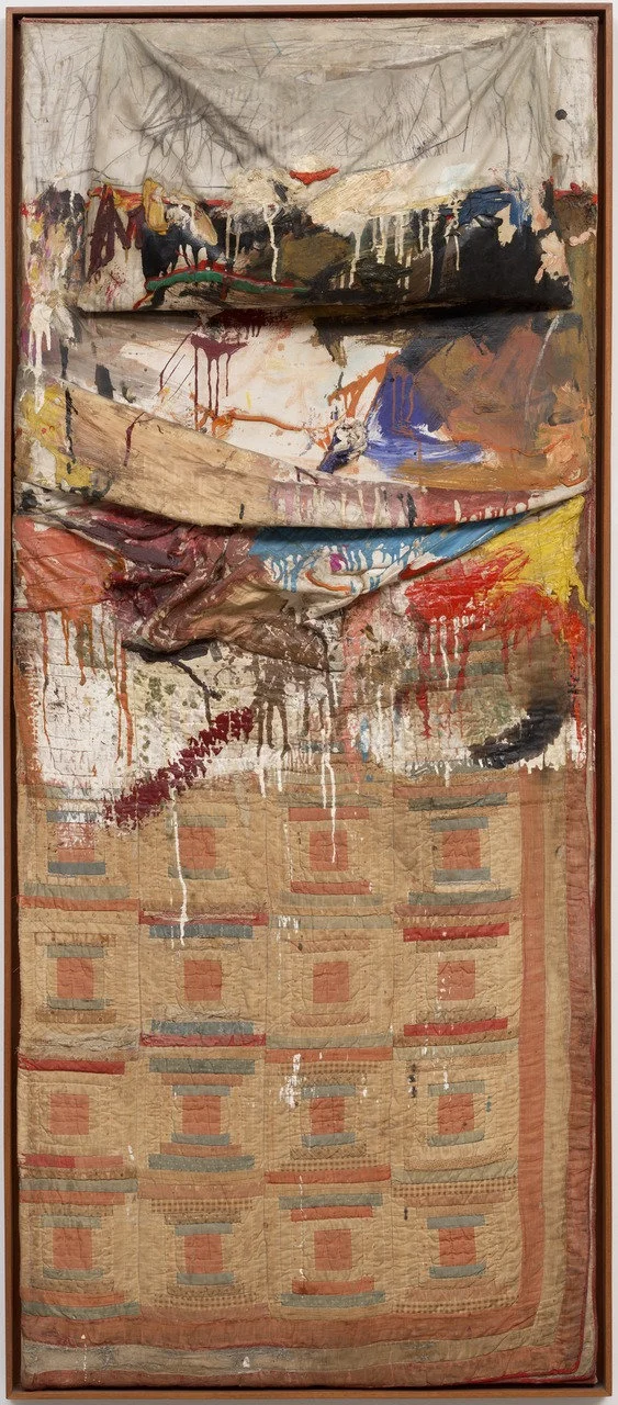 "Bed" by Robert Rauschenberg 75.25x31.5x8in, oil and pencil on pillow, quilt, and sheet on wood supports (1955) © 2017 Robert Rauschenberg Foundation