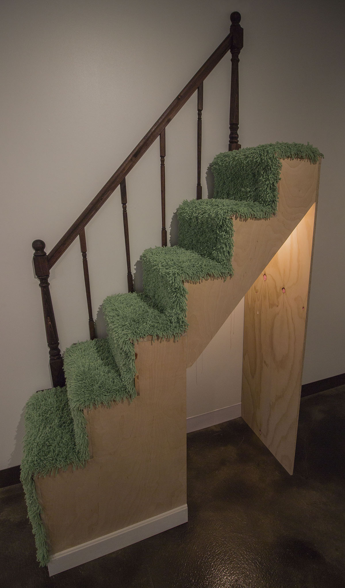 "In Hiding" by Miranda Becht, 119x64x24in, wood, cast resin, acrylic paint, shag carpet, embroidery floss, light fixture (2017)