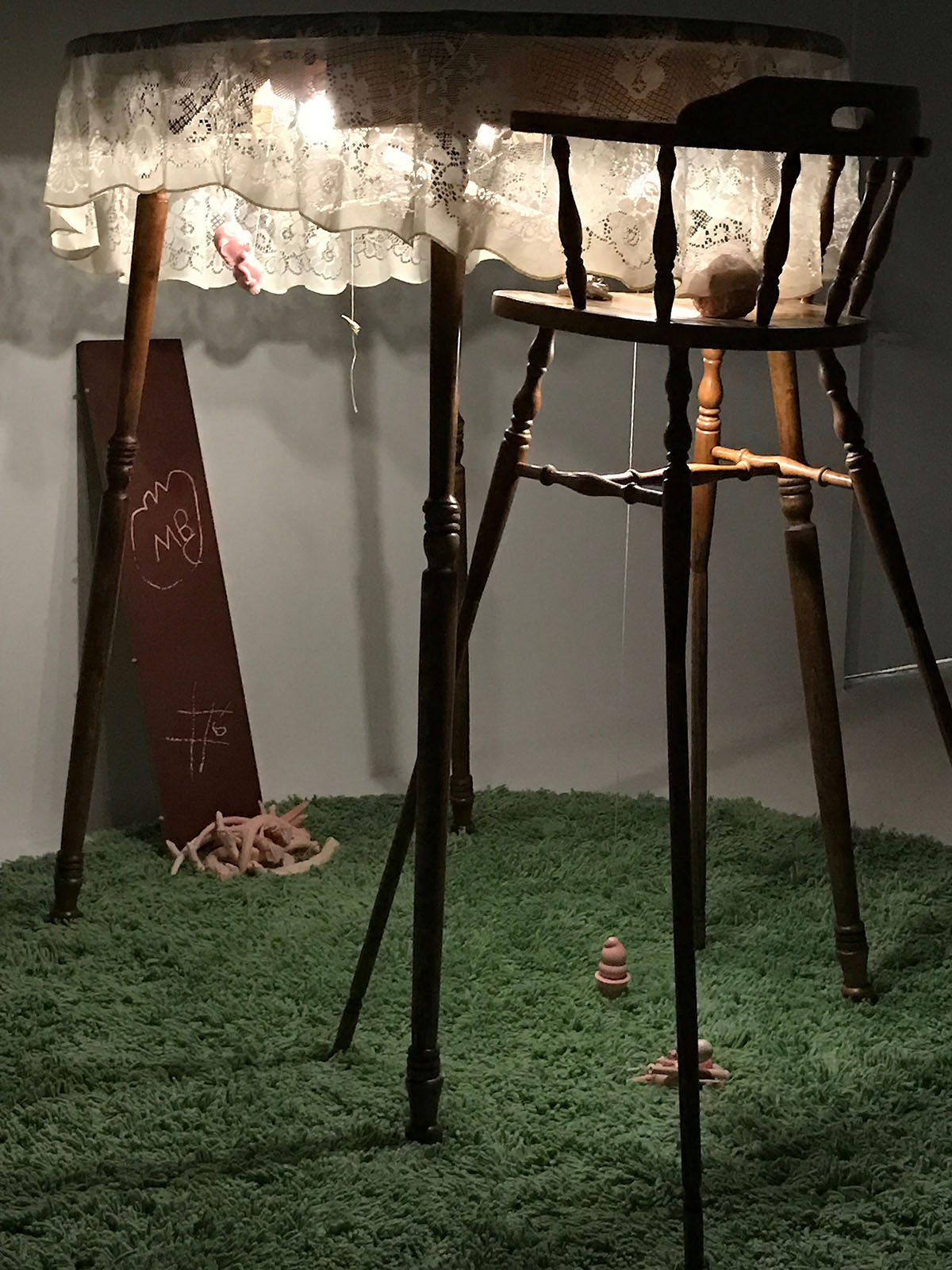 "Underside" by Miranda Becht, 96x96x66in, wood, screenprint, cast resin, rug, embroidery floss (2016)