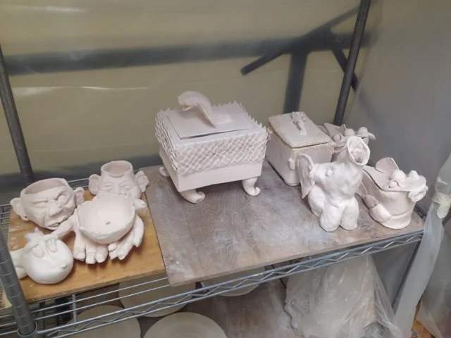 Ceramic pieces waiting to be fired.