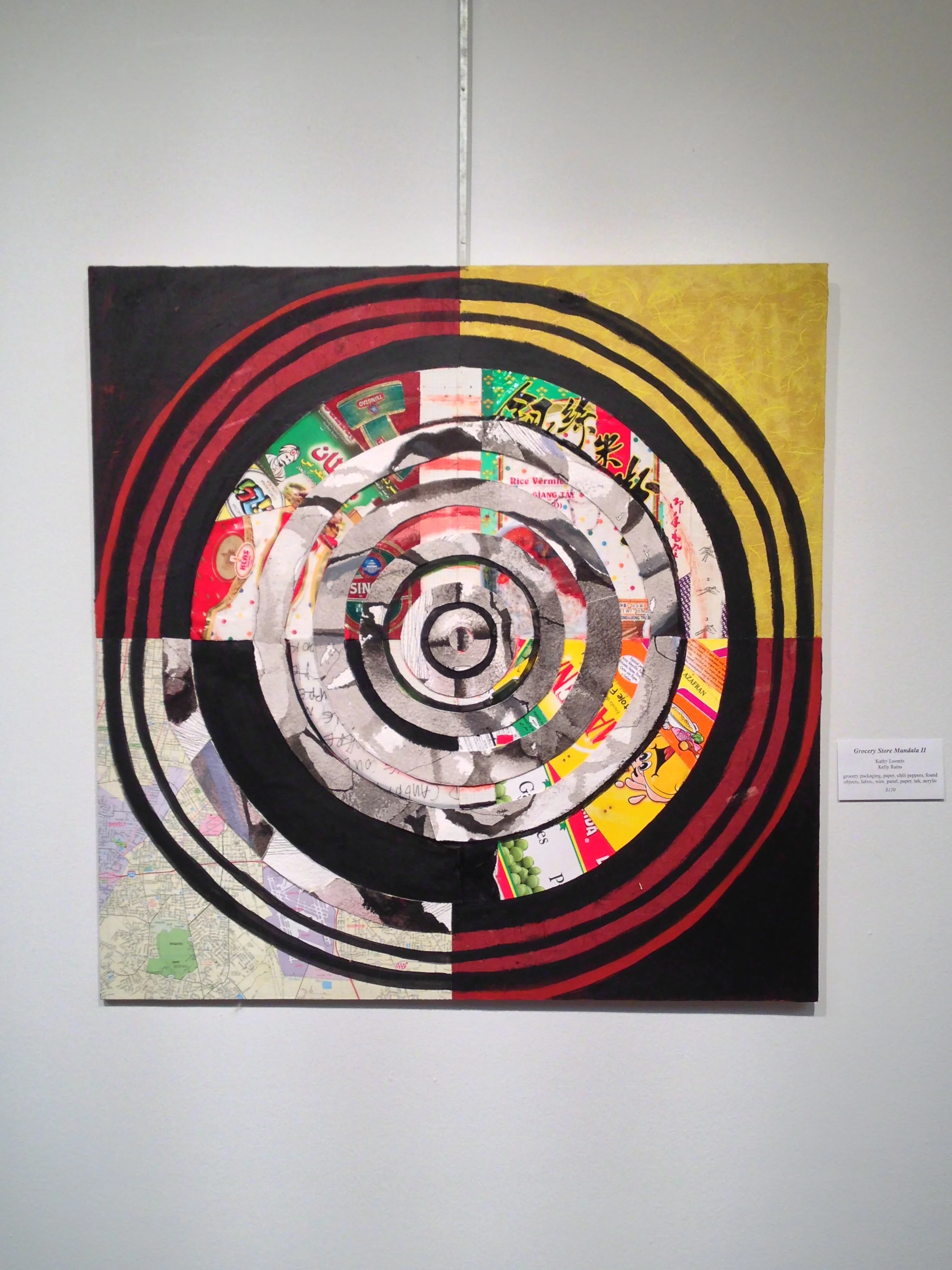 Grocery Store Mandala II, Kathy Loomis & Kelly Rains, grocery packaging, paper, chili peppers, found objects, fabric, wire, panel, paper, ink, acrylic, Price not available. (Photo courtesy of Kelly Rains.)