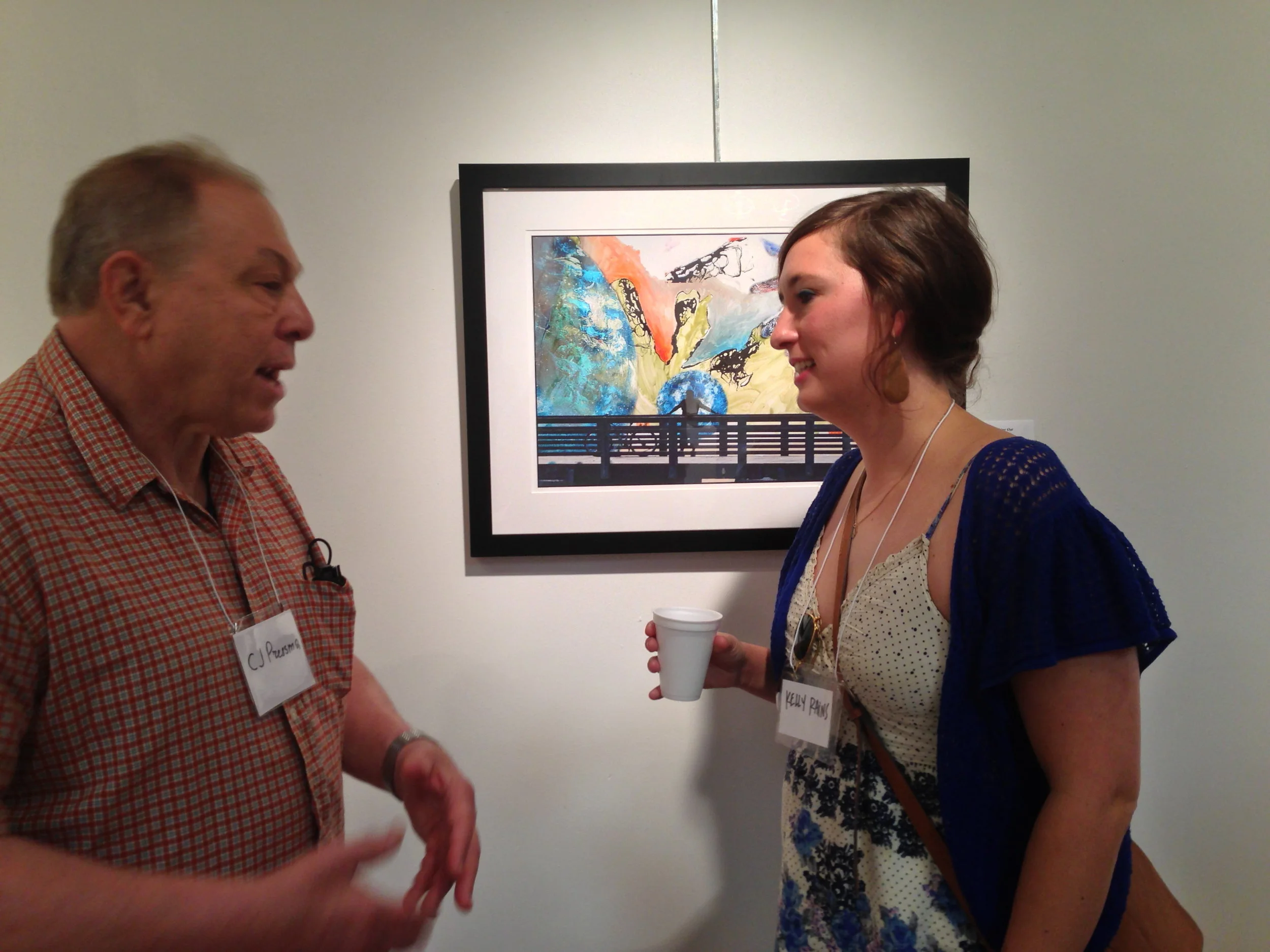 C.J. Pressma & Kelly Rains discuss the project in front of their piece. (Photo courtesy of Kelly Rains.)