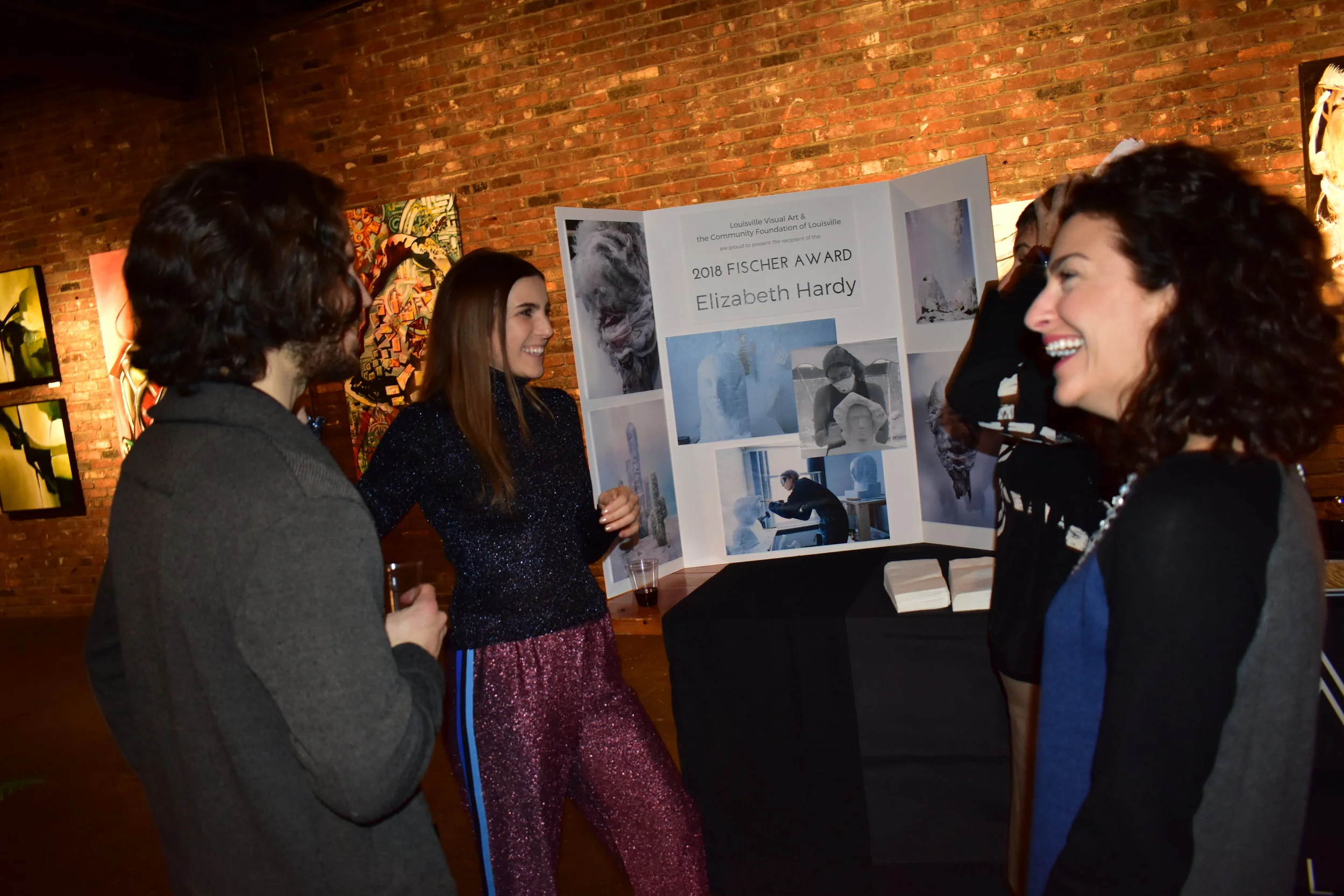 LVA partnered with the Community Foundation of Louisville in congratulating Elizabeth Hardy, the inaugural winner of the Bill Fischer Award for Visual Art ! The celebration was held at the Tim Faulkner Gallery, located across the street from LVA's office in Portland. Hardy plans to use her prize money "to provide a suitable environment with tools to establish a space to be able to create works on a larger scale than I am physically capable of doing with the restrictions of my current studio space. I could expand my practice for my own productions as well as have a proper venue to function as a learning environment that I could share the techniques I have learned with others."