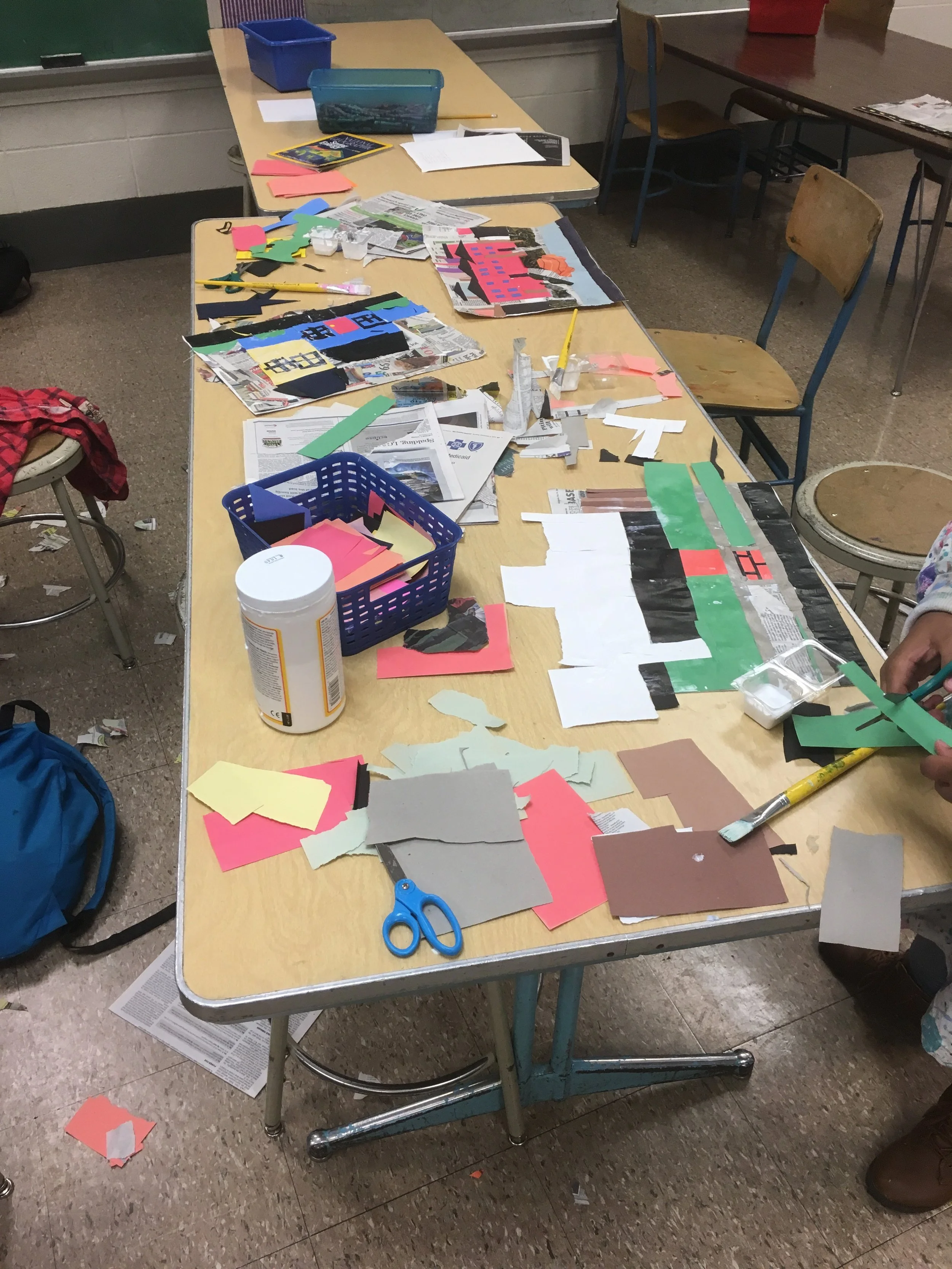 CFAC instructor Julia had King Elementary 4th & 5th-grade students look at Romare Bearden's collage paintings, then discussed how to make a landscape of their home. They talked about historical figures and heroes, and what those heroes would be wearing and doing if they lived in their neighborhood. This is mainly a collage project but students were allowed to expand into other materials once they covered the whole page.