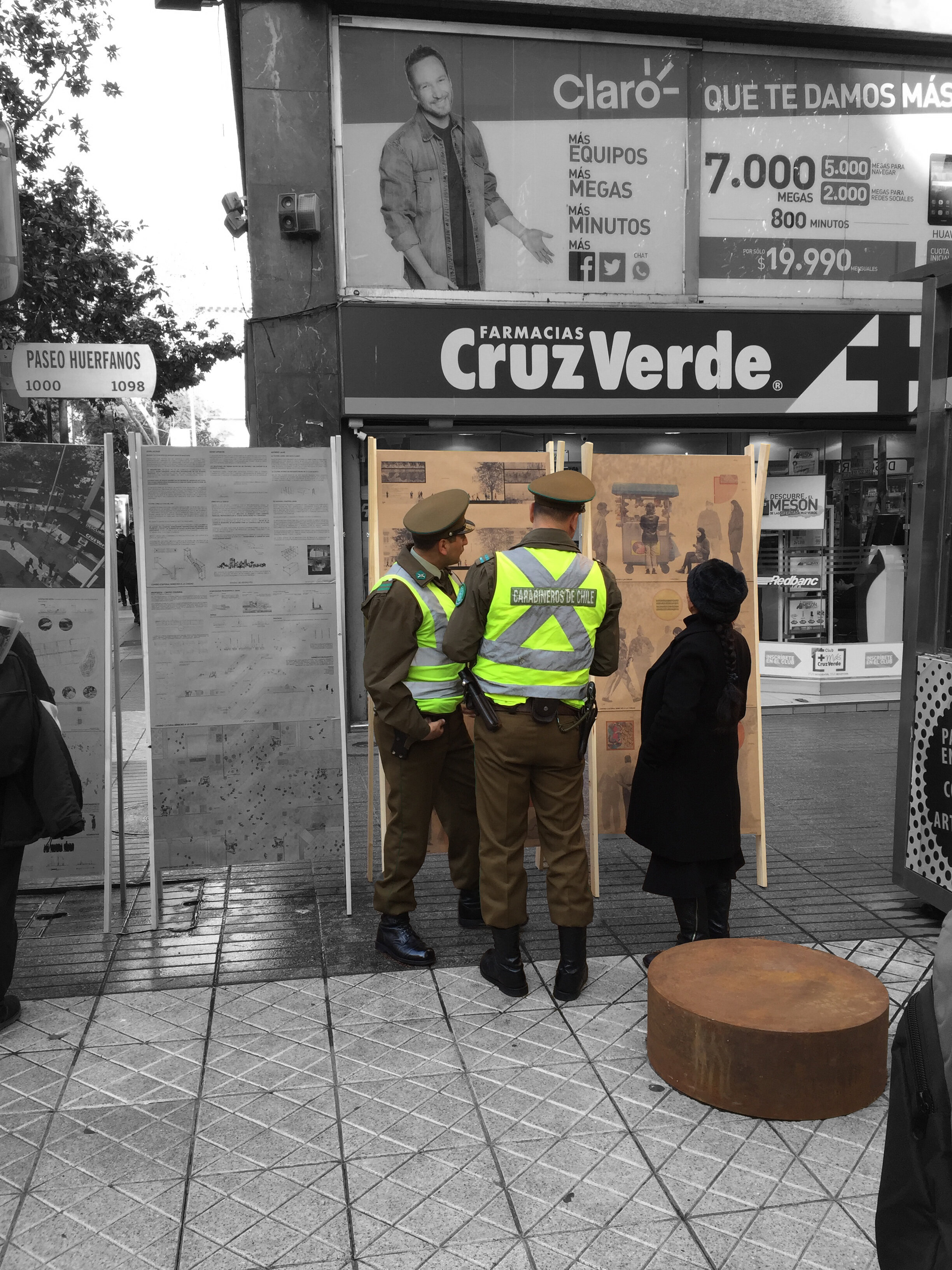 07.22.2016 — In some cases, architecture has the ability to influence and shift—even in an ephemeral way—the social power dynamics of an existing community. The Right to the City Cultural Center intervention was built at the intersection of the two busiest pedestrian walkways in downtown Santiago without any formal permit. Police officers are supposed to take down appropriations of public space that aren’t formally authorized; here, instead, police converse with passerby, explaining rather than dismantling the intervention. This image is evidence of the potential for architectural interventions to create novel social interactions.
