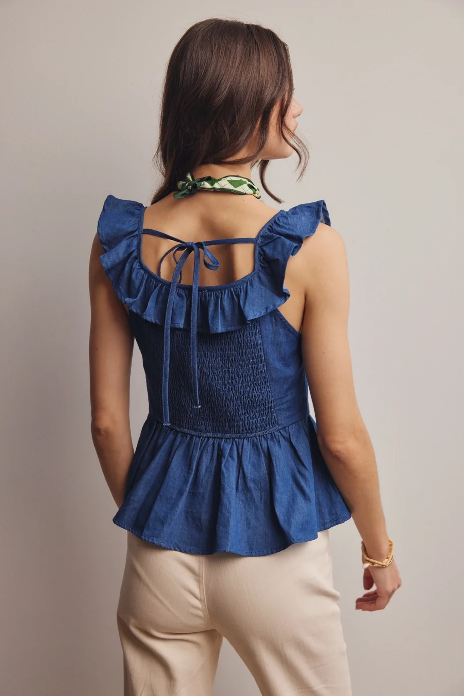 denim-peplum-ruffle-tie-back-top.webp