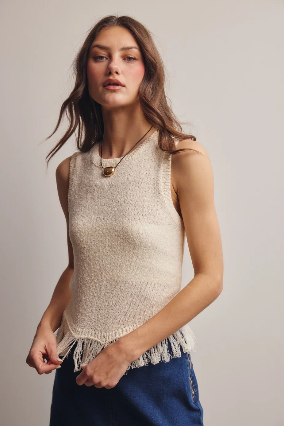 knit-sleevelss-fringe-sweater.webp