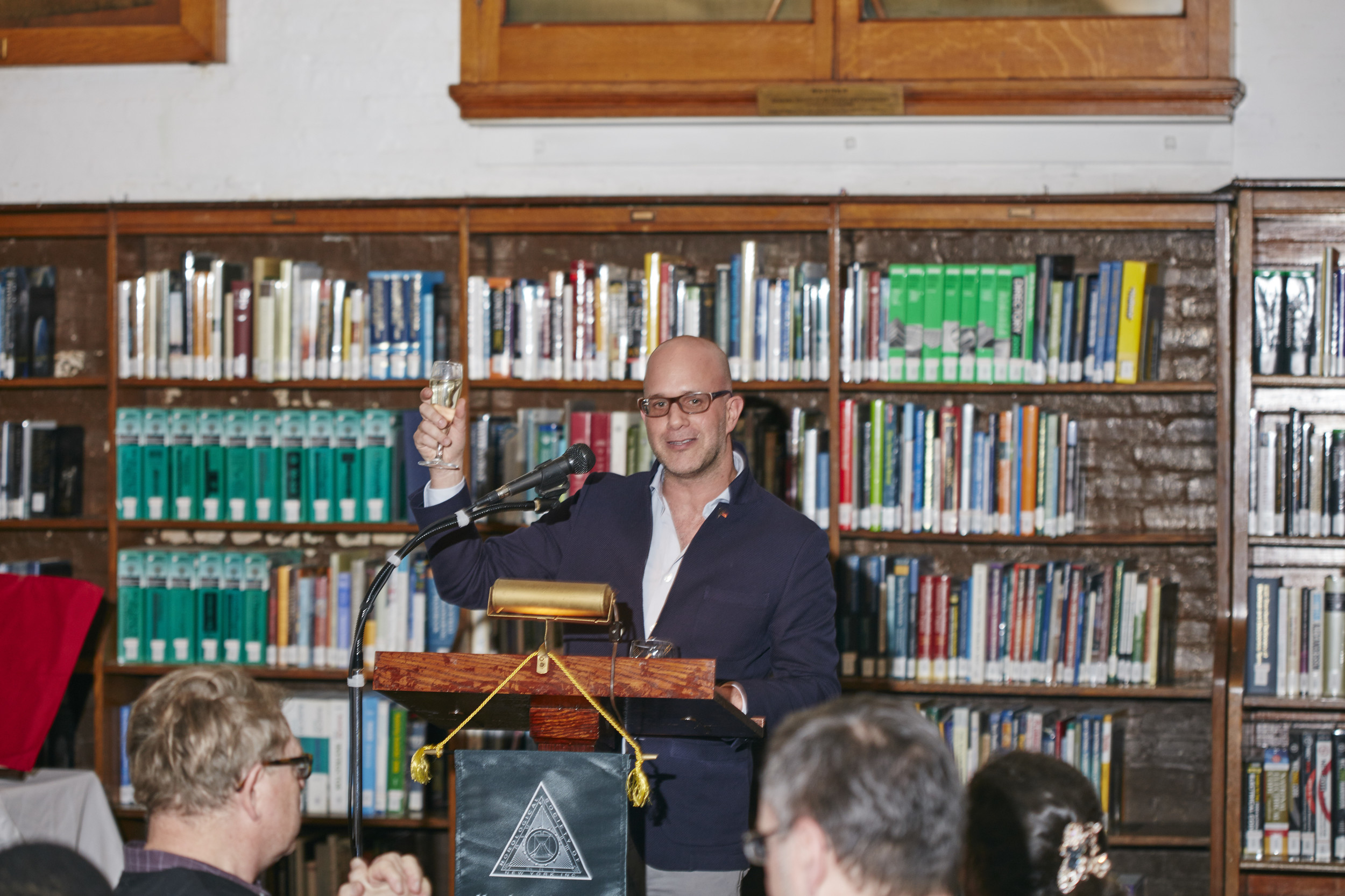 Michael Friedman, Historian for Audemars Piguet, toasting to HSNY's 150th anniversary