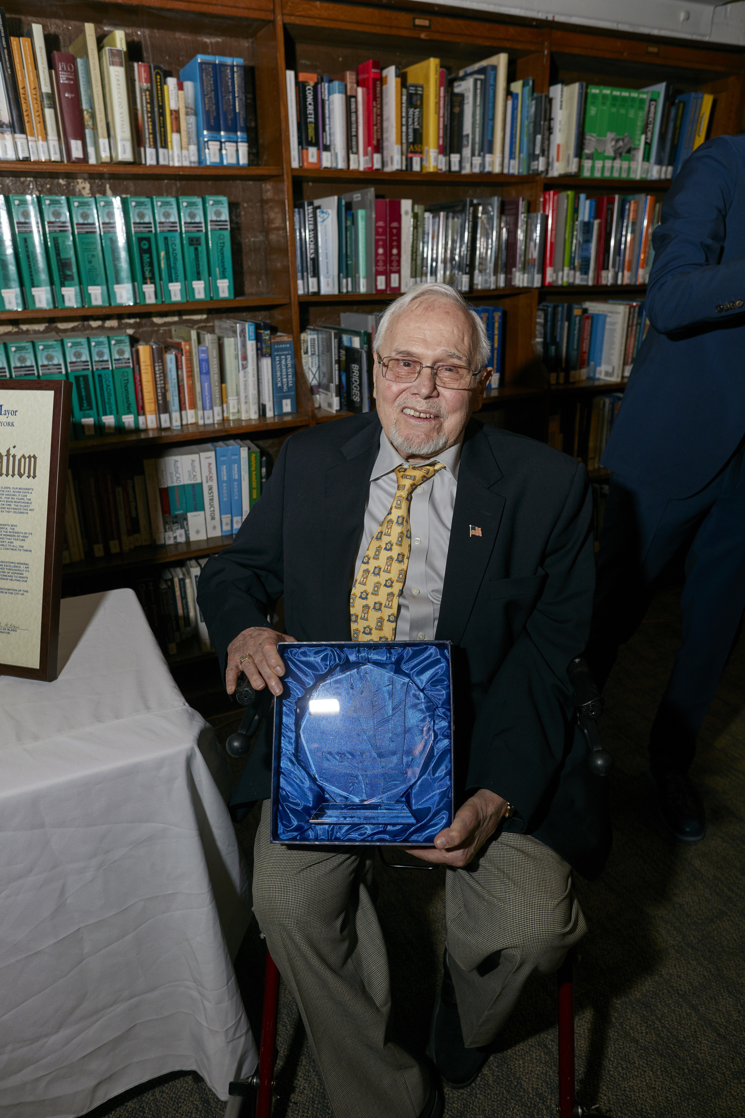  Hans Weber, HSNY Trustee &amp; Fellow, displaying the Howard Fass Award he received earlier in the night 