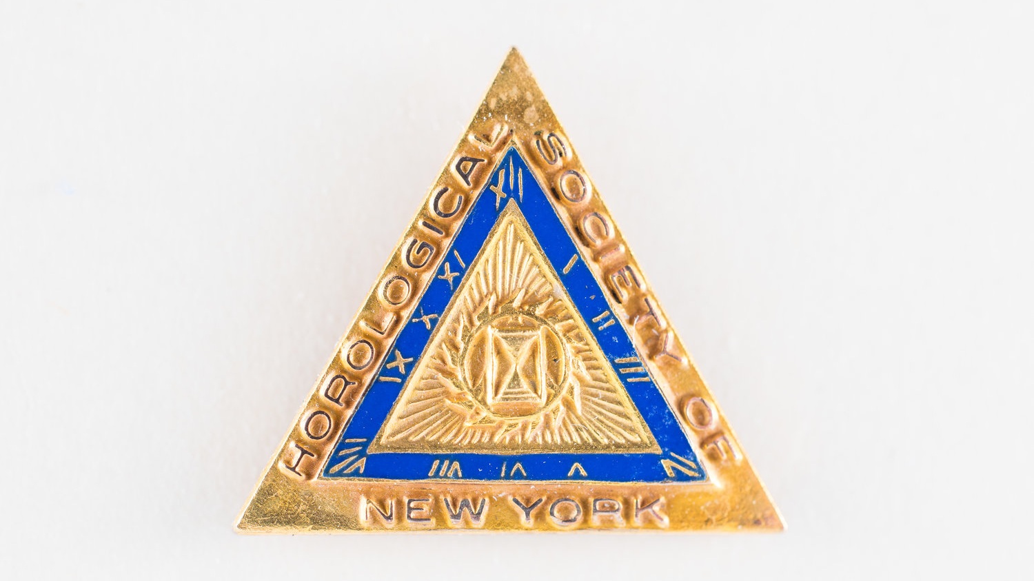 Lot 1 - Horological Society of New York Vintage Lapel Pin, Circa 1930 Only a handful of these original pins still exist. Gold-filled, brand new, never worn. Estimate: $1,000 - $2,000