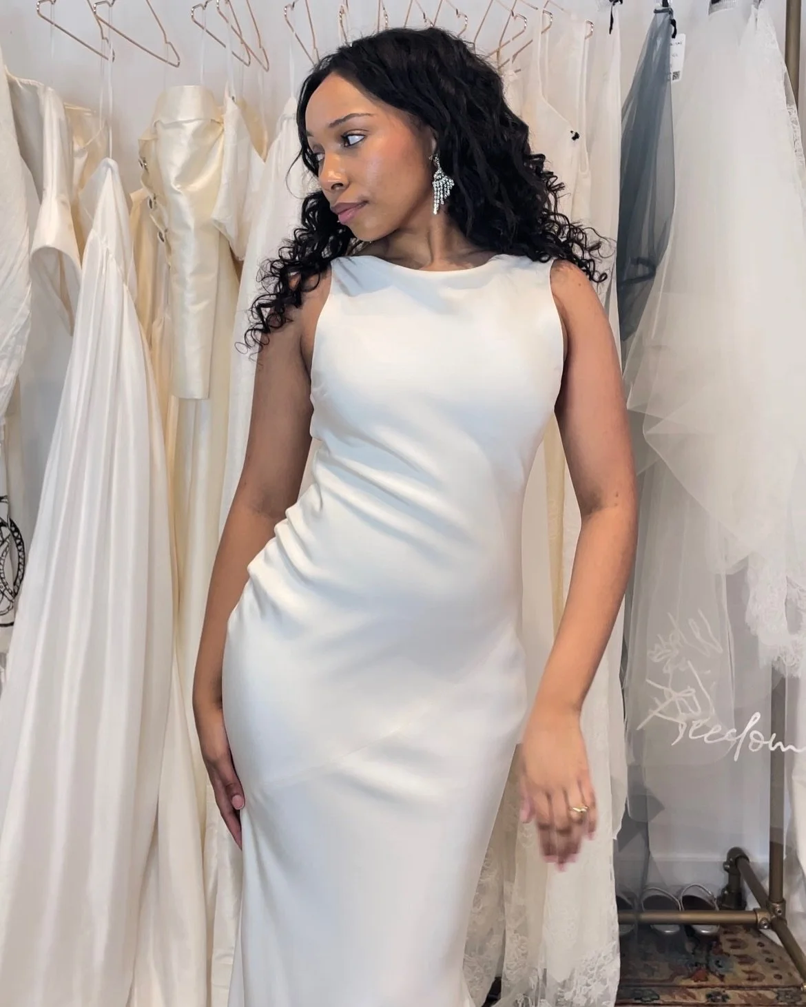 the Boos gown, a Goli June classic

Made from a luxurious crepe and cut on the bias to hug every curve. Featuring an ultra-high neck cowl that seamlessly blends into the deep v back. The perfect wedding look for brides who want something elegant yet 
